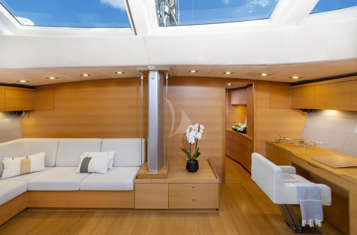 a room with a couch and a table aboard BLACK LION Yacht for Sale