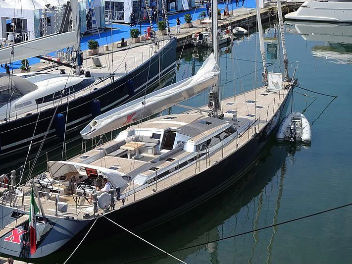 a large boat in the water aboard BLACK LION Yacht for Sale
