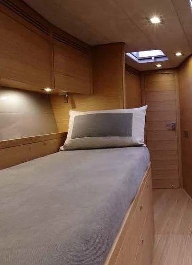 a bed in a room aboard BLACK LION Yacht for Sale