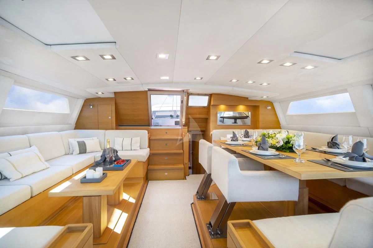 a room with a couch and a table aboard BLACK LION Yacht for Sale