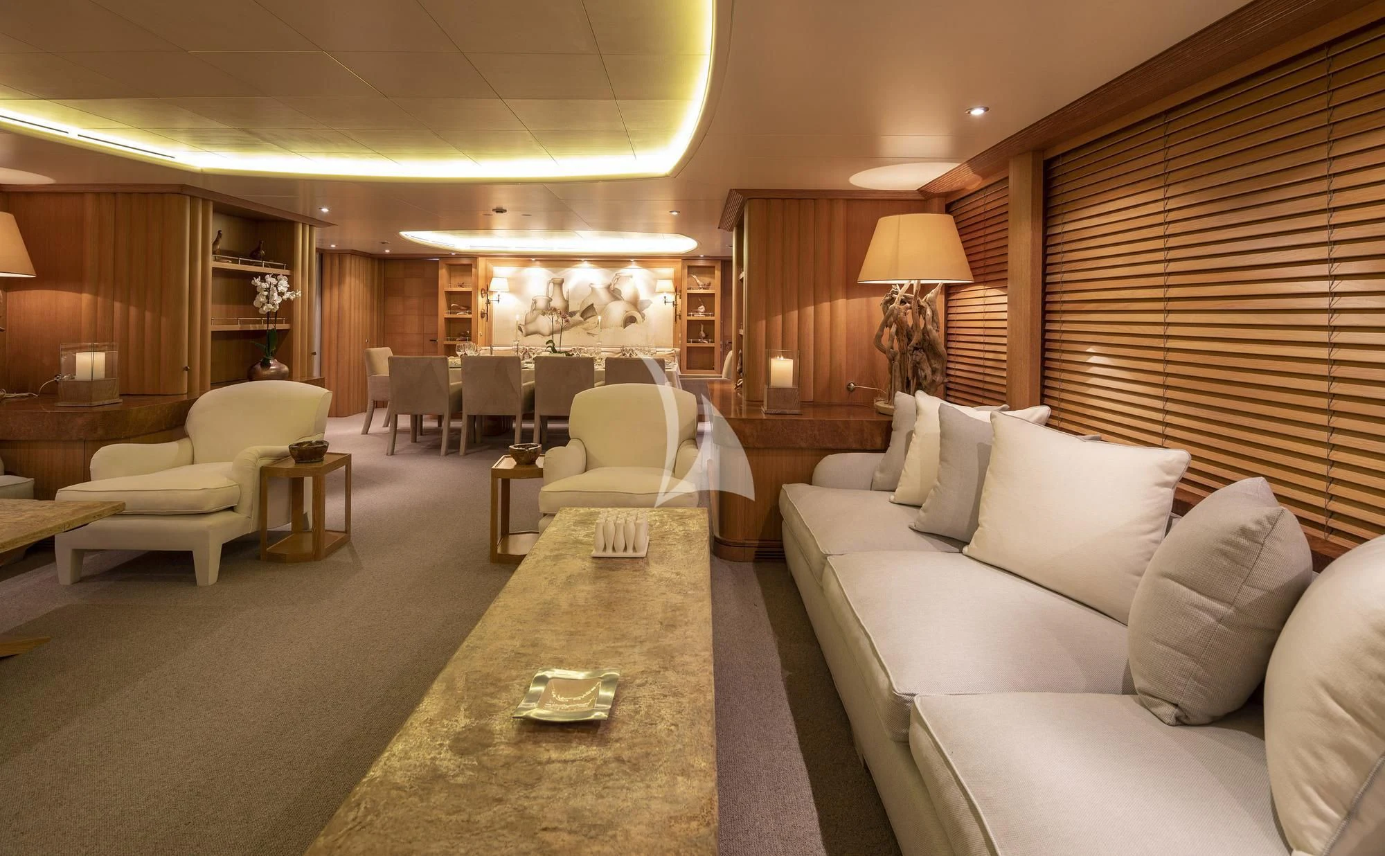 a living room with a couch and a coffee table aboard ALEXANDRA Yacht for Charter