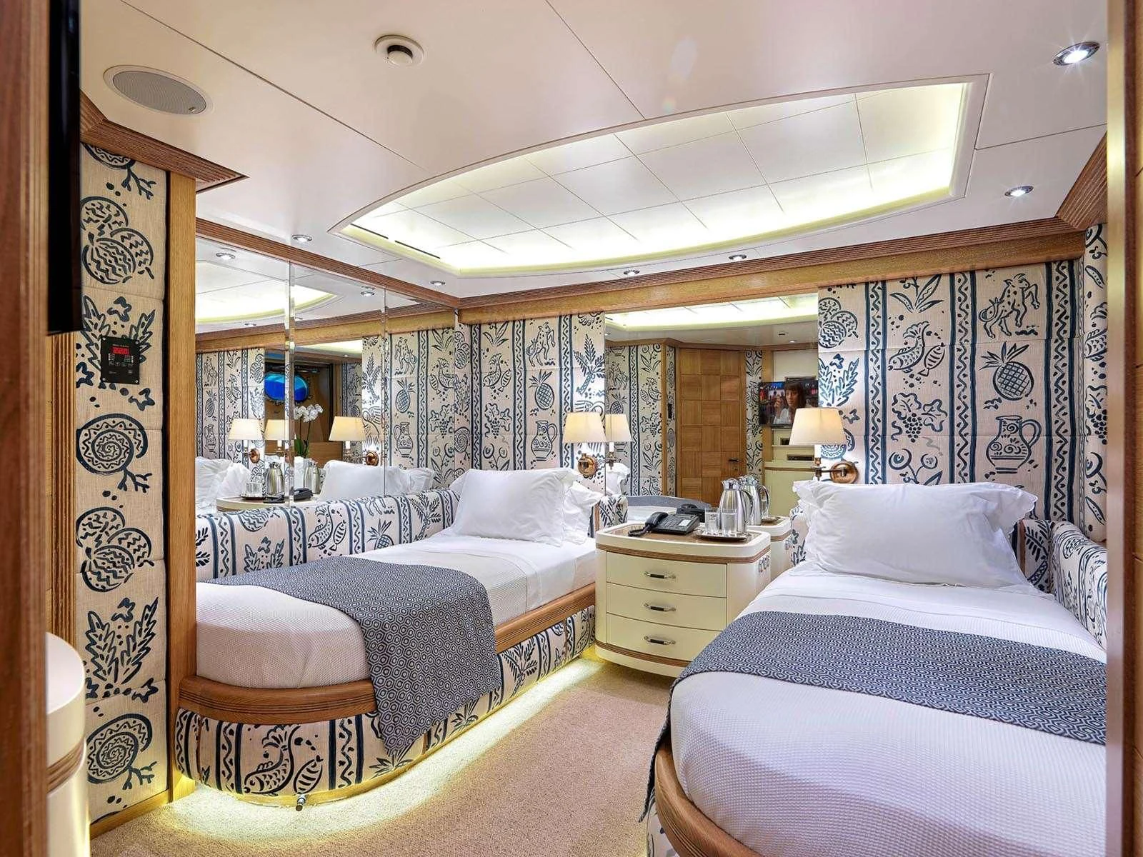 a room with a couple of beds aboard ALEXANDRA Yacht for Charter