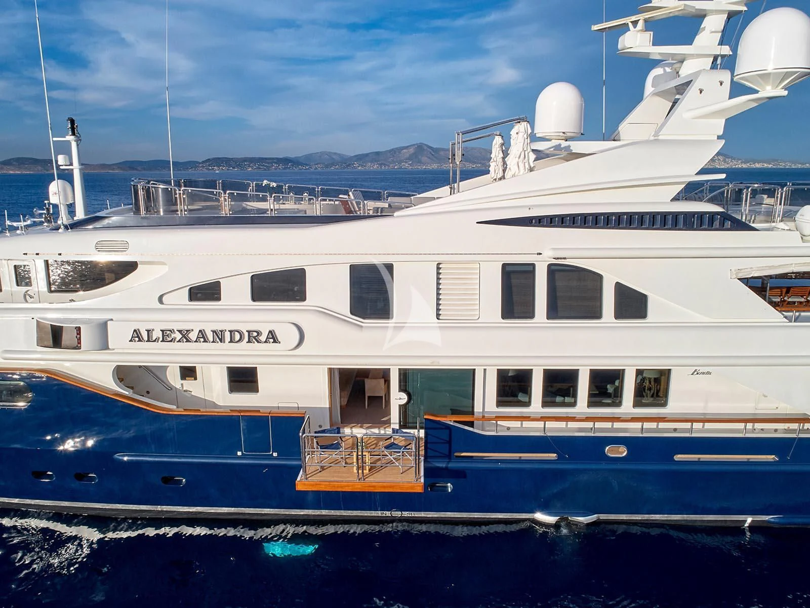 a large white boat in the water aboard ALEXANDRA Yacht for Charter