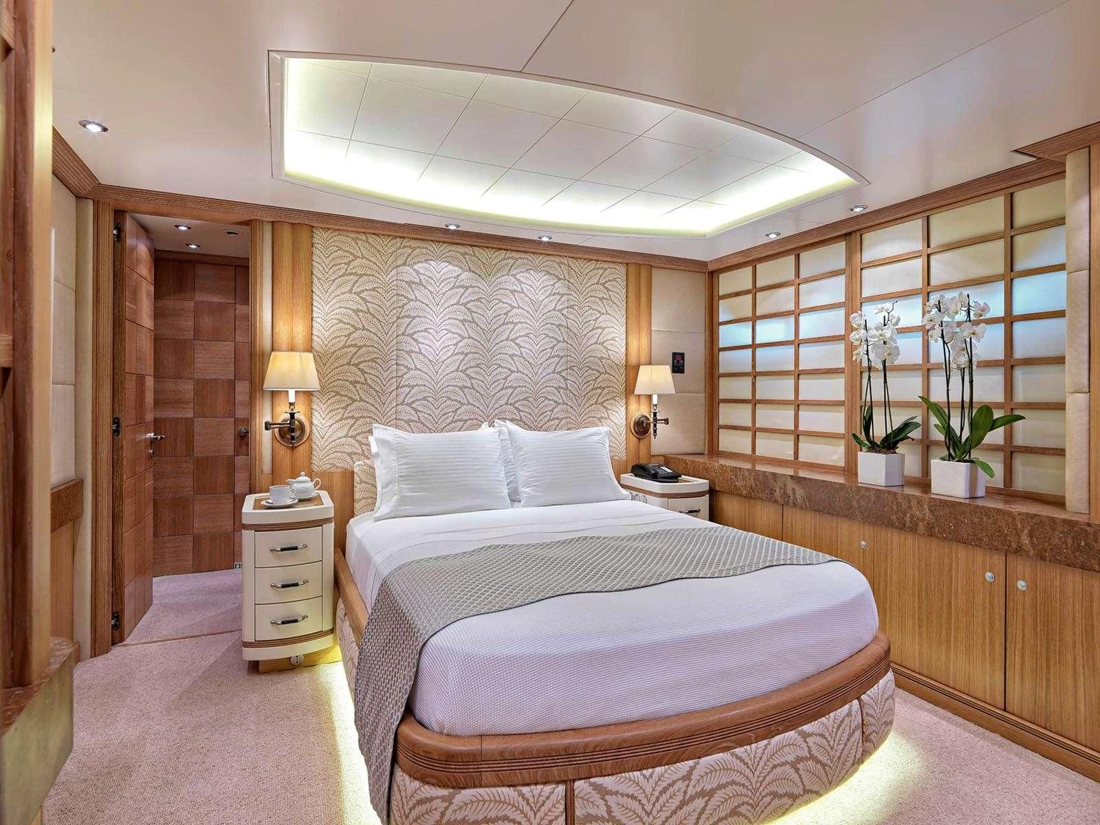 a bed in a room aboard ALEXANDRA Yacht for Charter