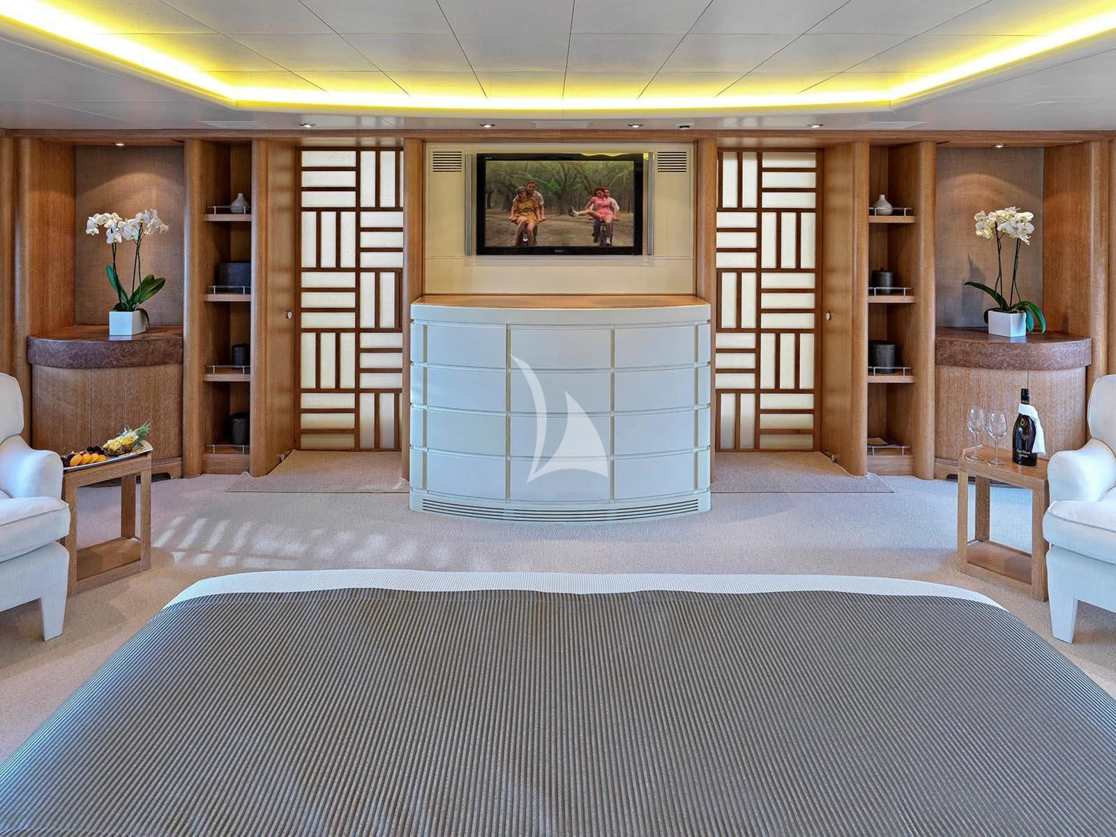 a large room with a fireplace aboard ALEXANDRA Yacht for Charter