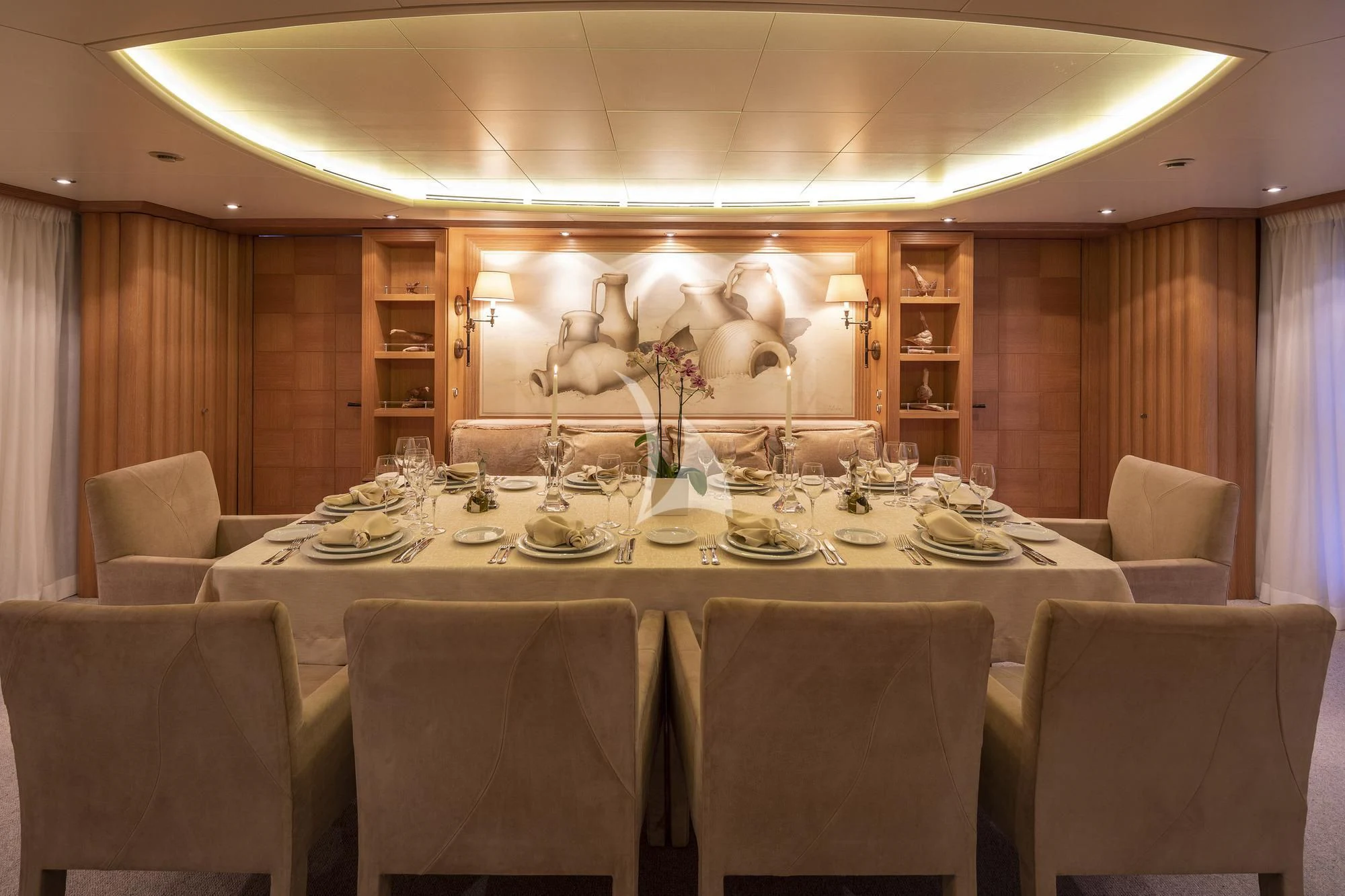 a dining room with a table set aboard ALEXANDRA Yacht for Charter
