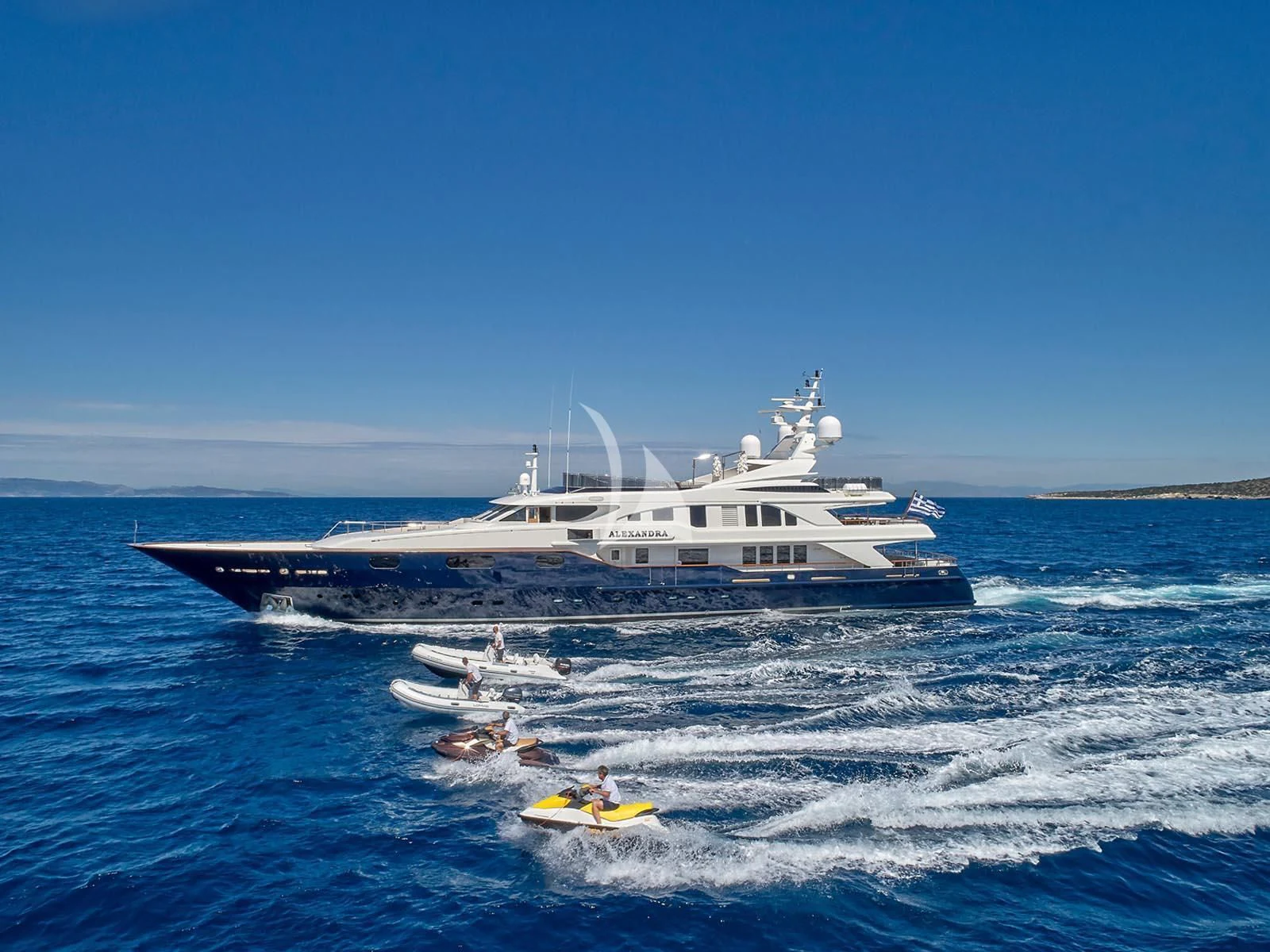 a large ship in the water aboard ALEXANDRA Yacht for Charter