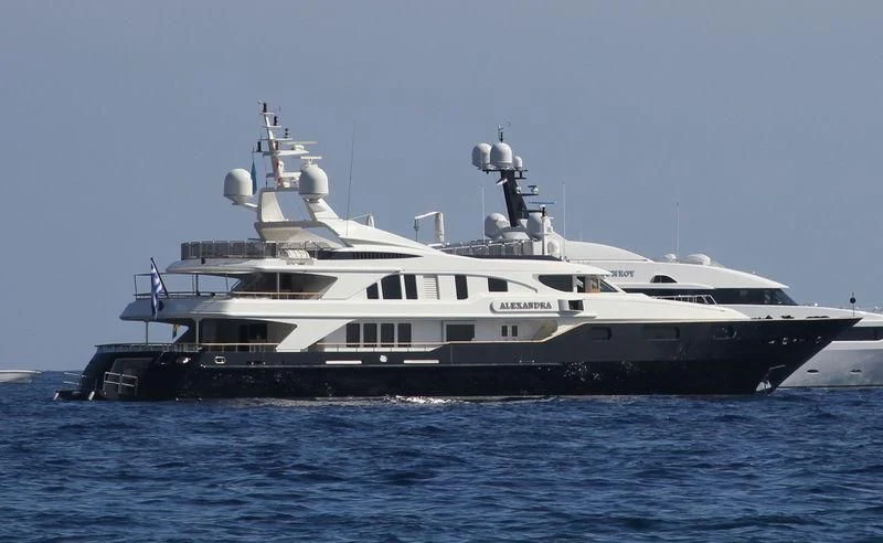 a large white boat on the water aboard ALEXANDRA Yacht for Charter
