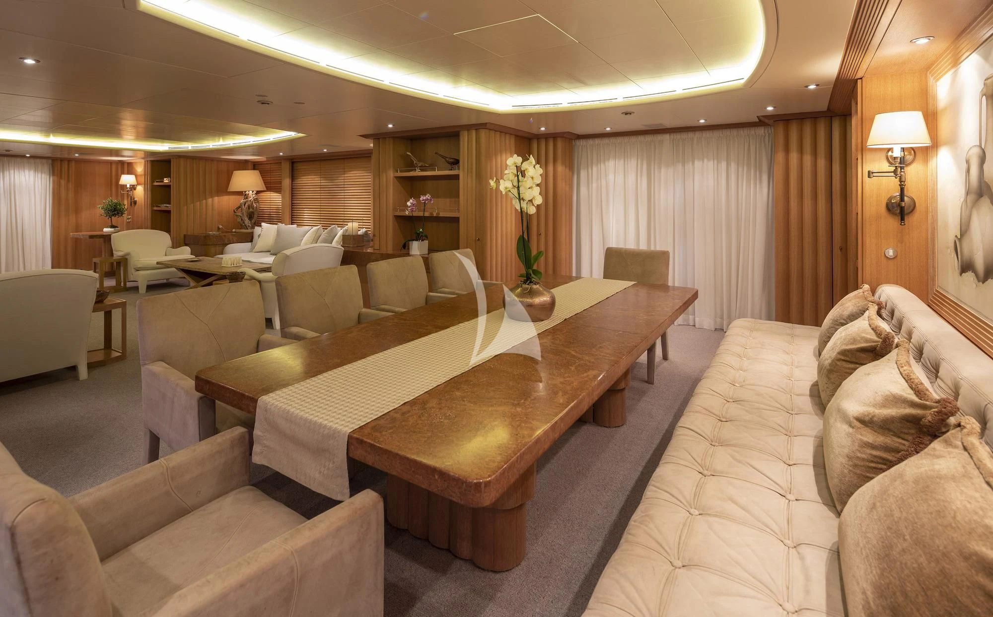 a living room with a couch and a table aboard ALEXANDRA Yacht for Charter