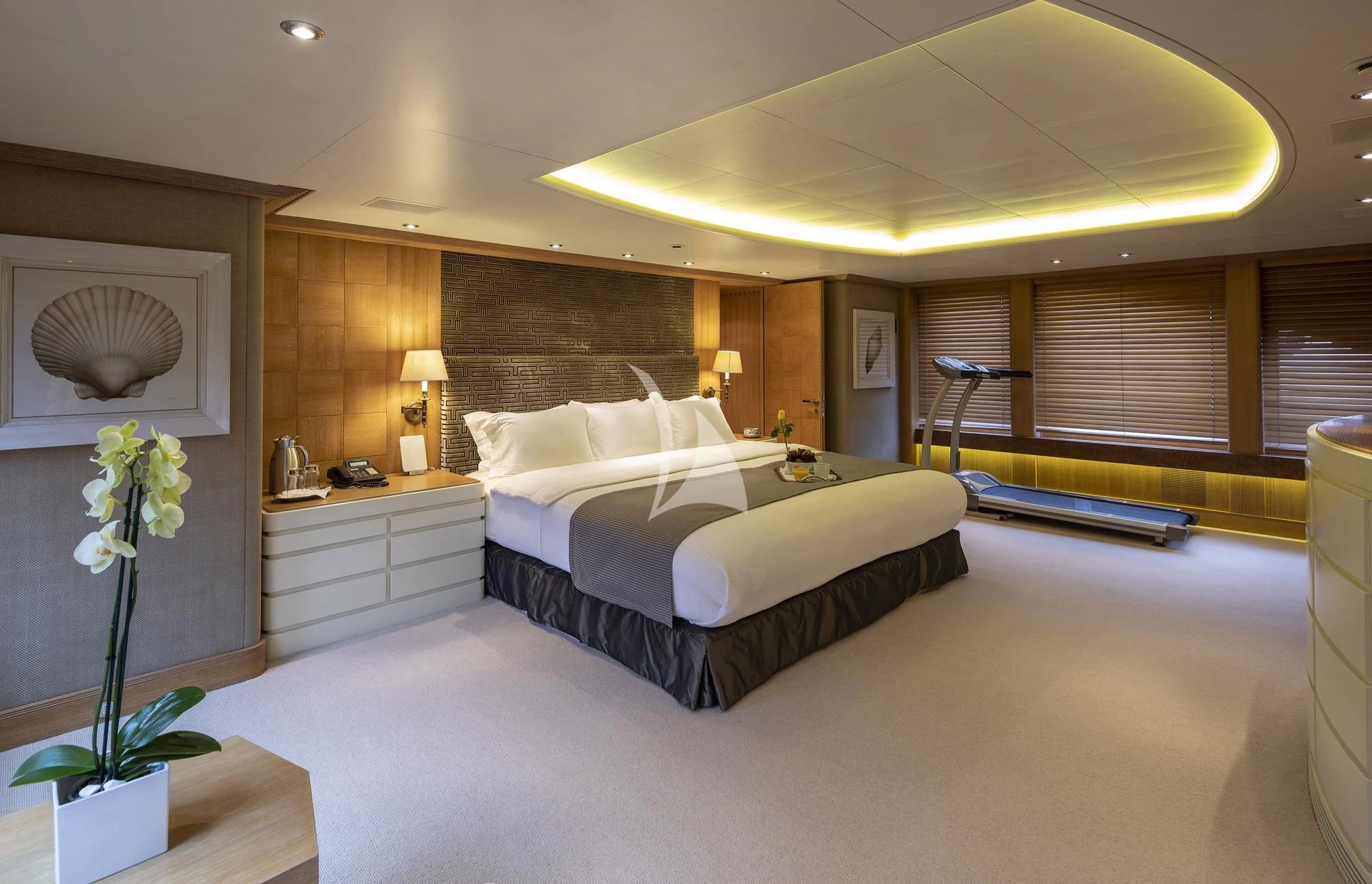 a large bedroom with a large bed aboard ALEXANDRA Yacht for Charter