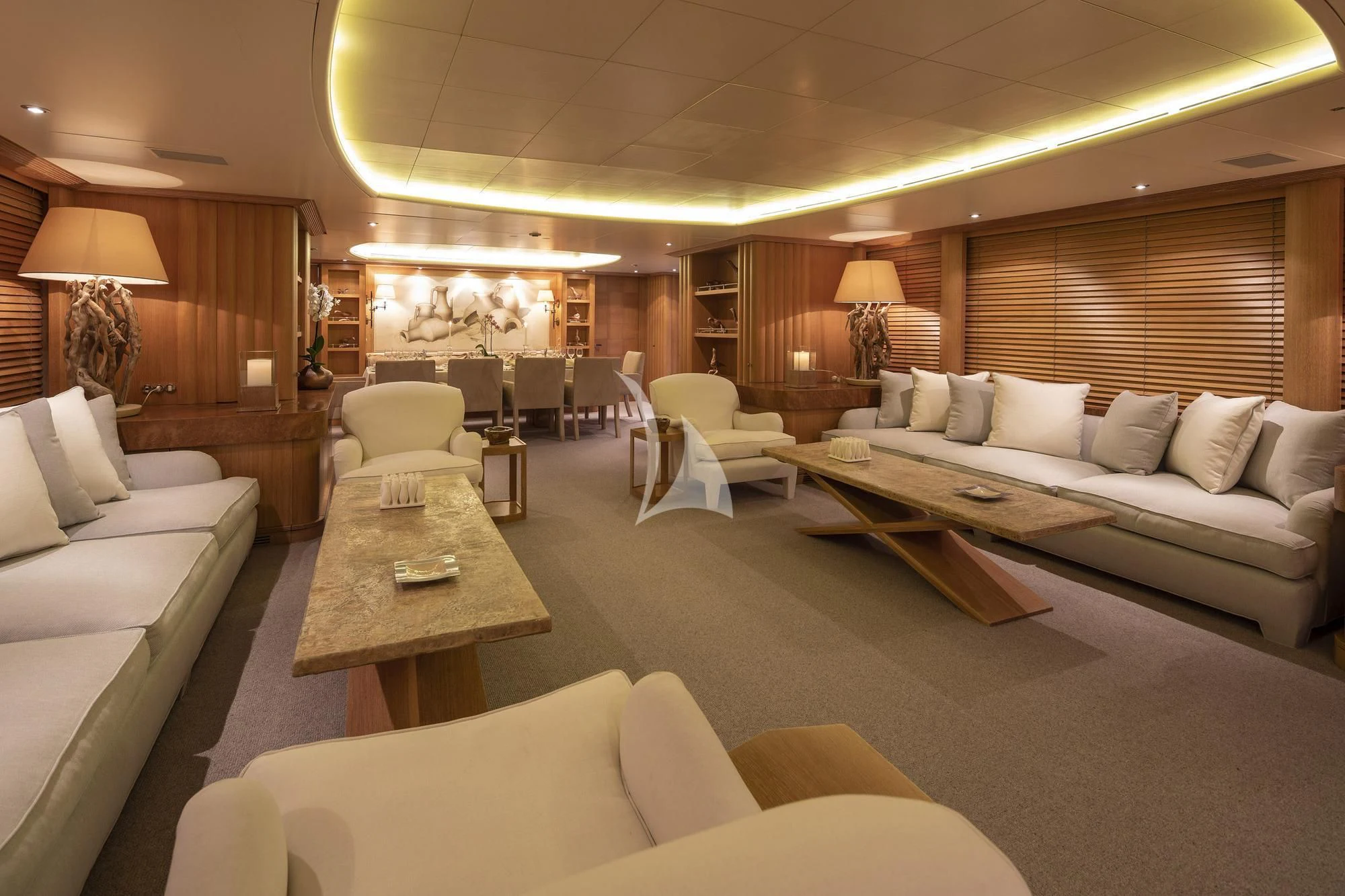 a living room with a couch and a table aboard ALEXANDRA Yacht for Charter