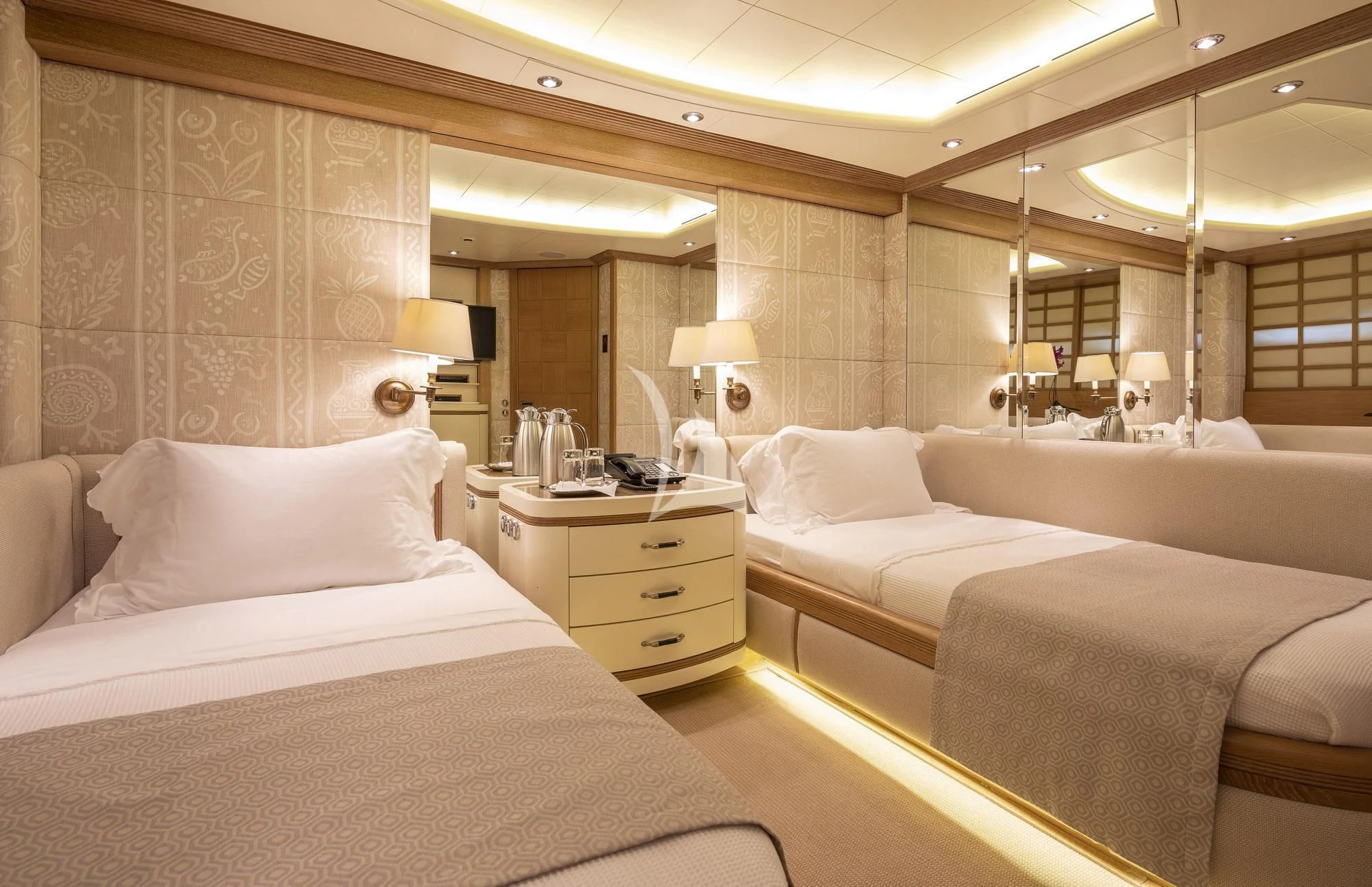 a hotel room with two beds aboard ALEXANDRA Yacht for Charter