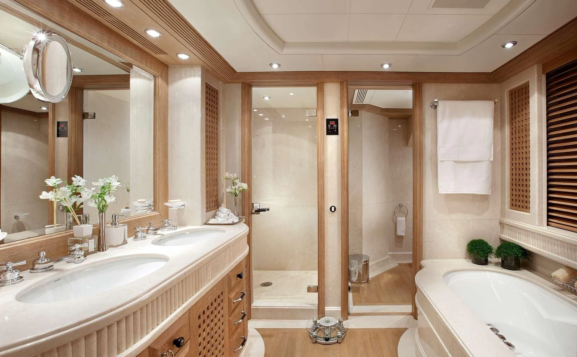 a bathroom with a bathtub and sink aboard ALEXANDRA Yacht for Charter