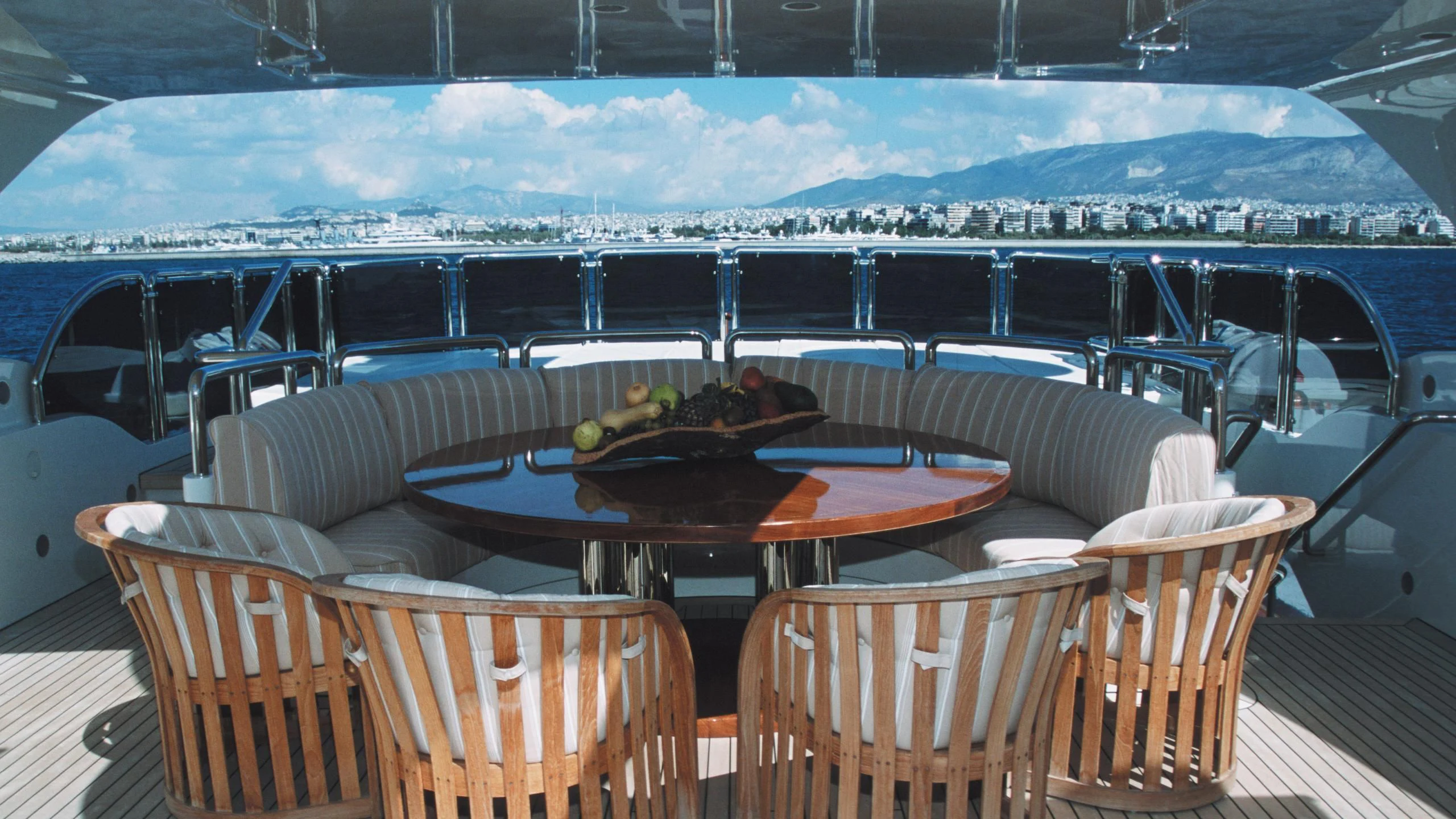 a table and chairs in a room aboard ALEXANDRA Yacht for Charter