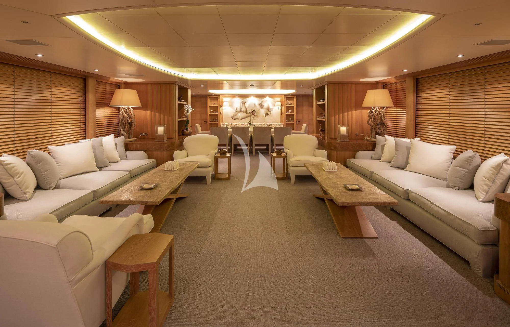 a living room with a couch and a table aboard ALEXANDRA Yacht for Charter