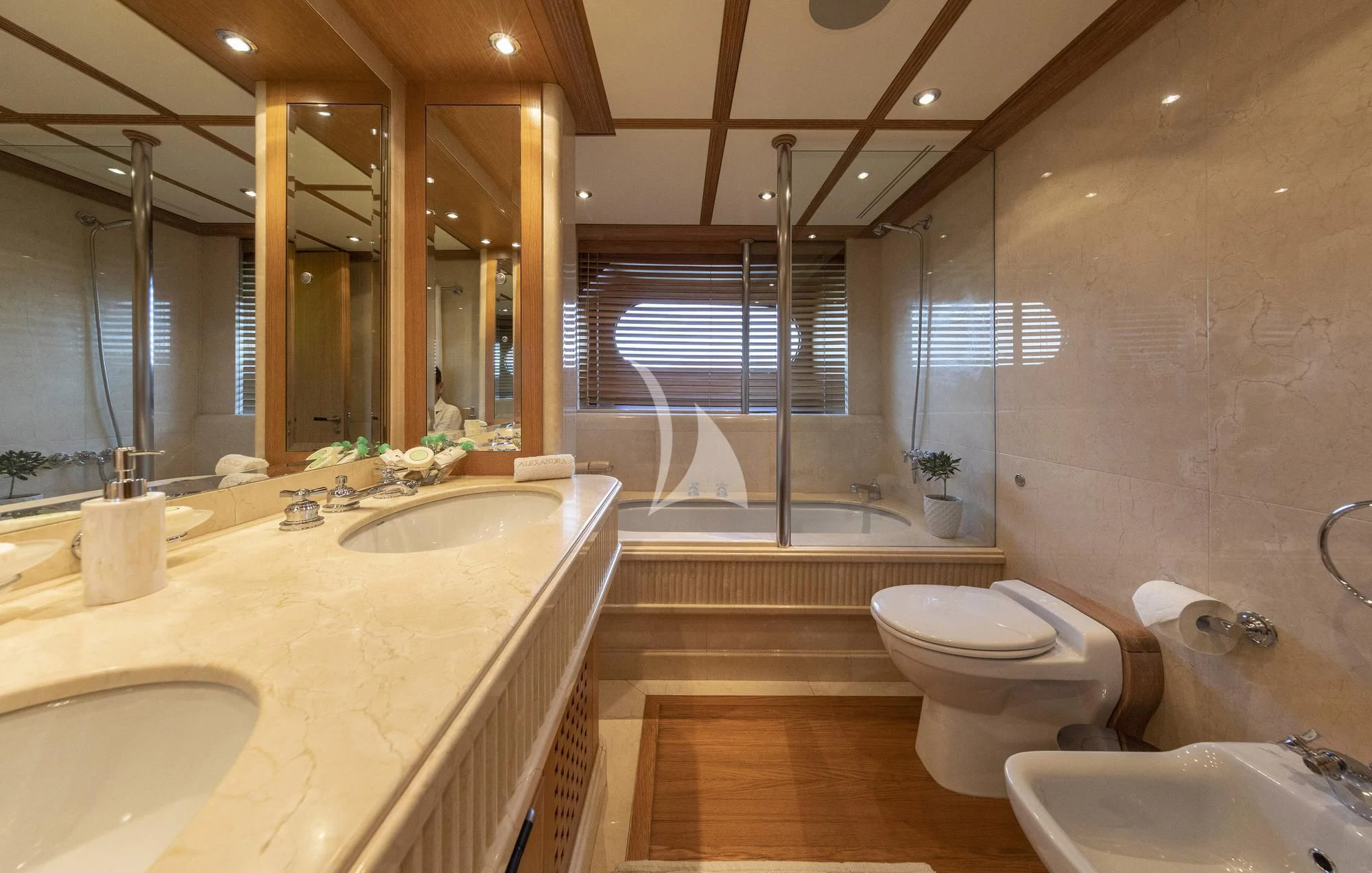 a bathroom with a glass shower aboard ALEXANDRA Yacht for Charter