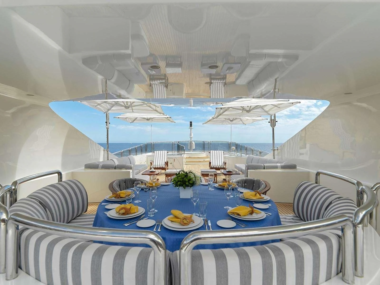 a table set for a meal aboard ALEXANDRA Yacht for Charter
