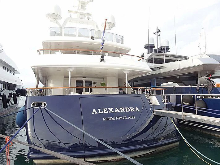 a group of boats are parked in a harbor aboard ALEXANDRA Yacht for Charter