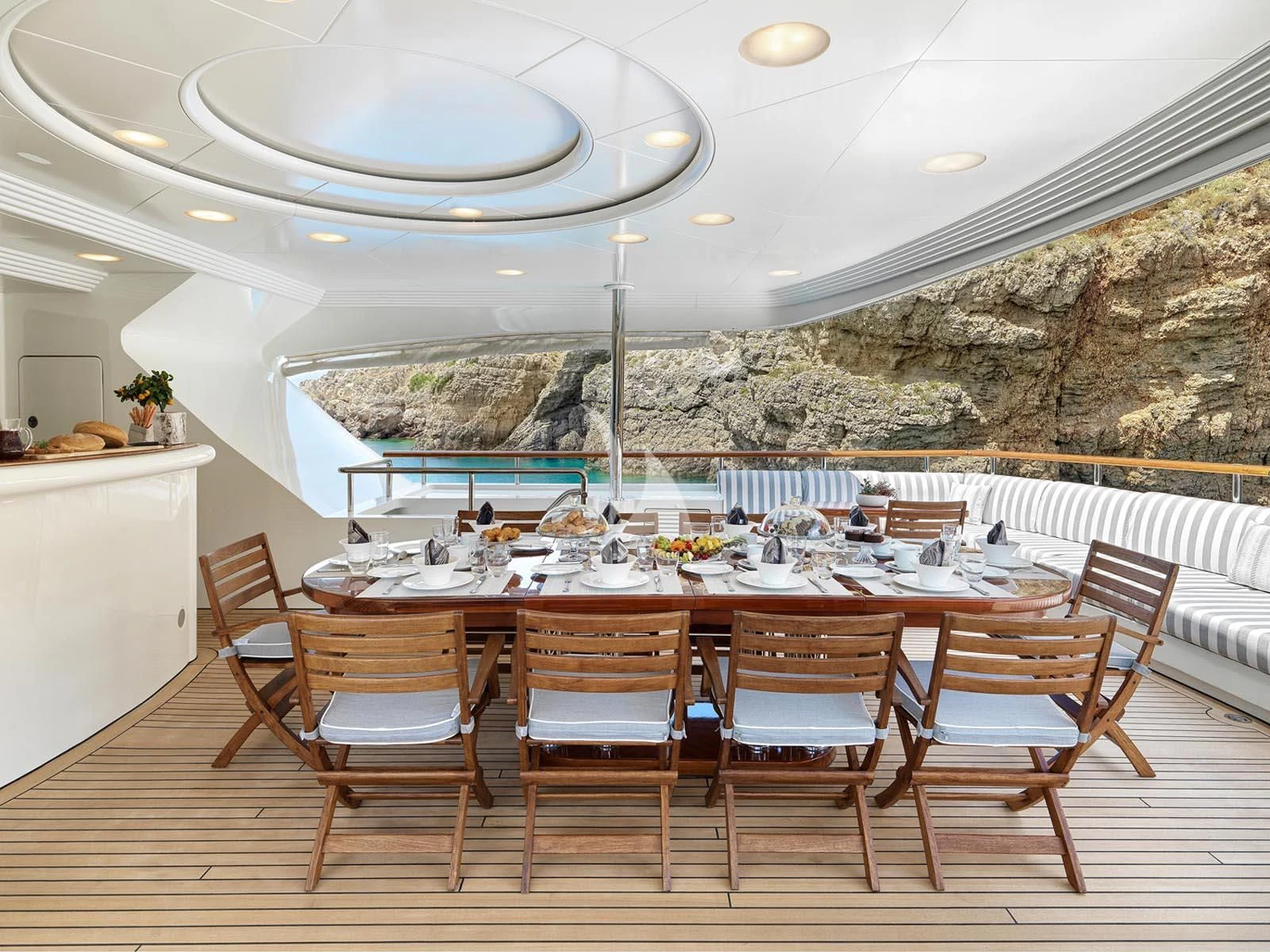 a table set for a meal aboard ALEXANDRA Yacht for Charter