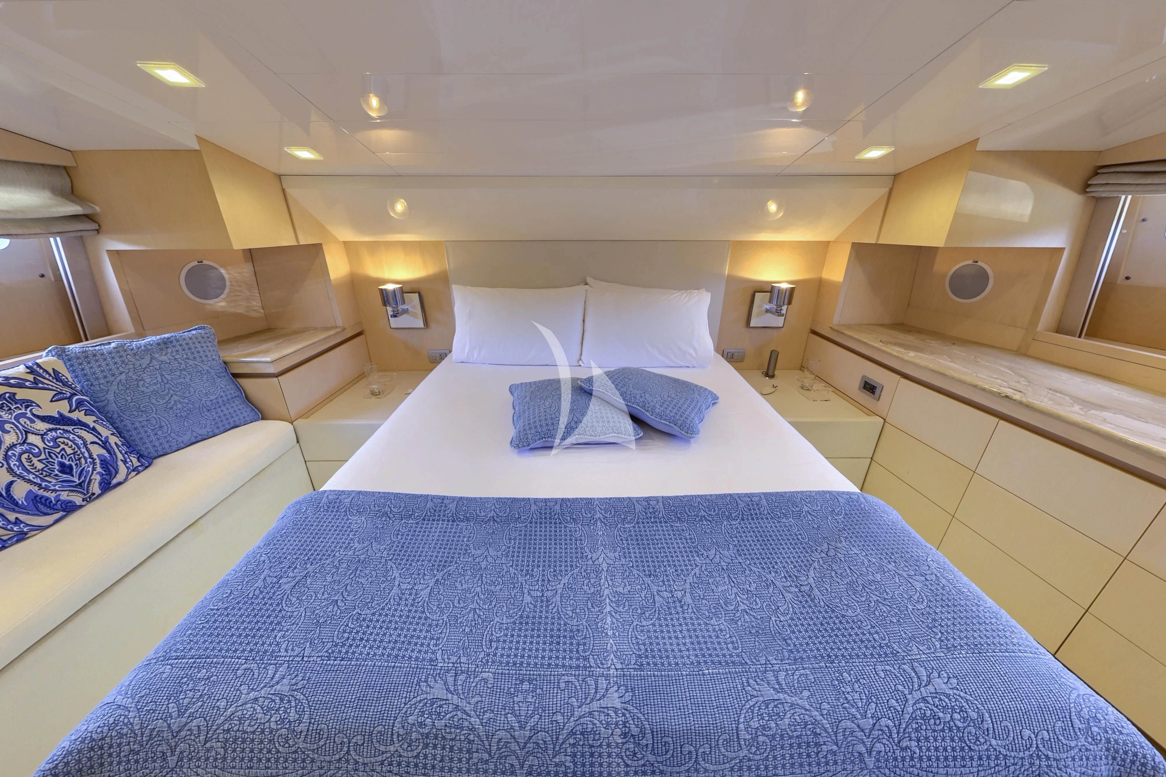 a room with a couple of beds aboard TUSCAN SUN Yacht for Charter