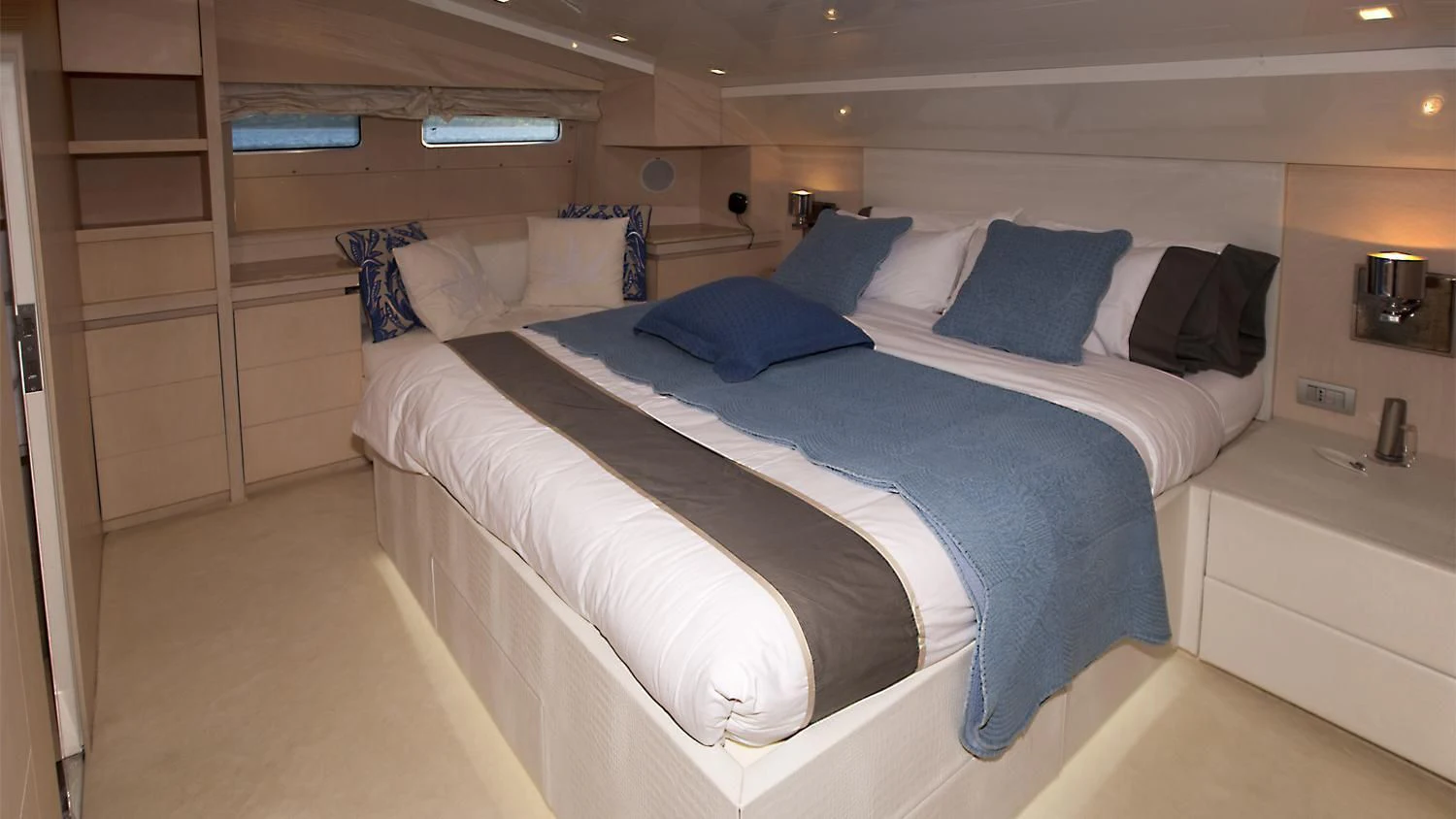 a bed in a room aboard TUSCAN SUN Yacht for Charter