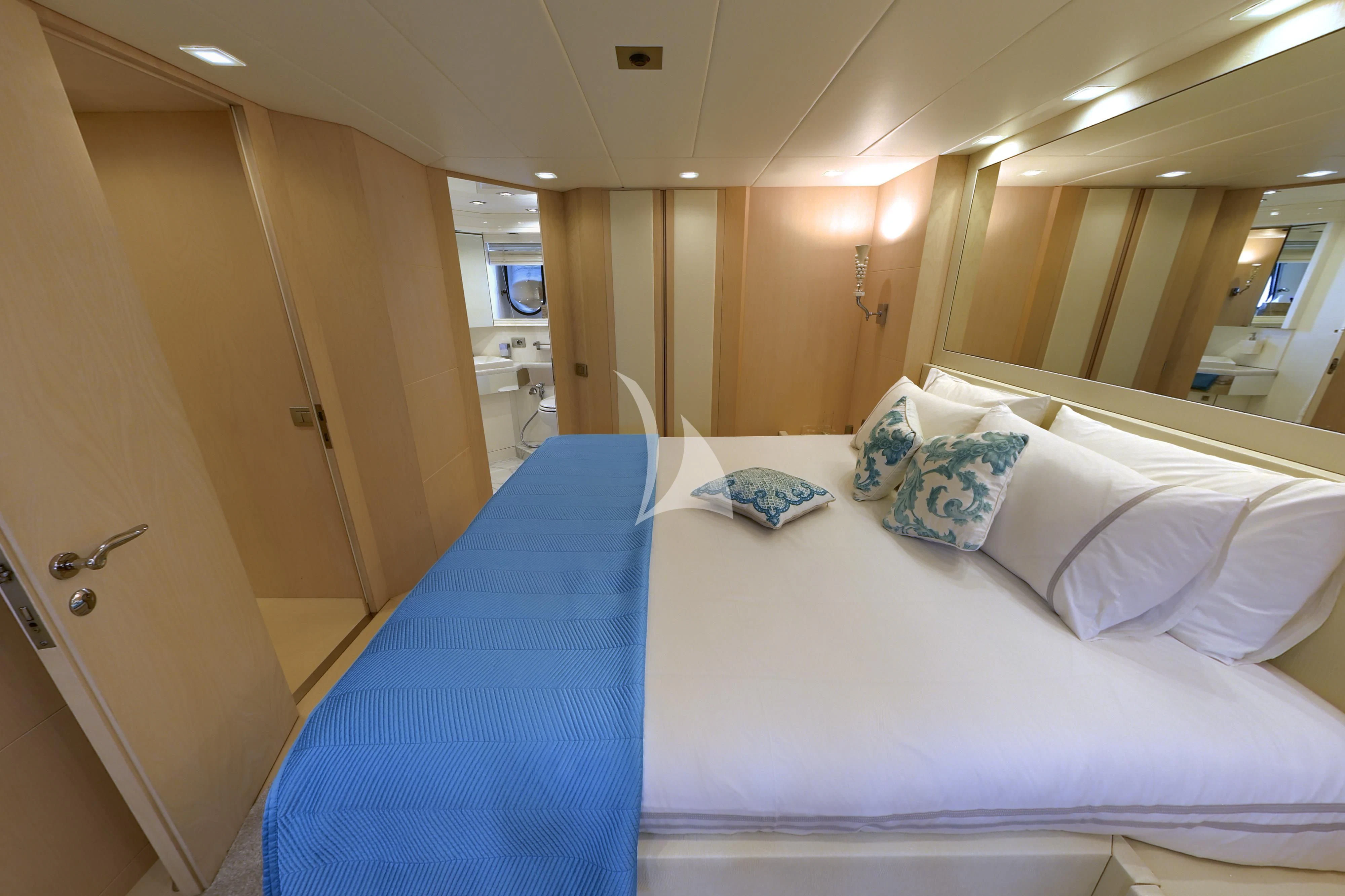 a hotel room with a bed aboard TUSCAN SUN Yacht for Charter