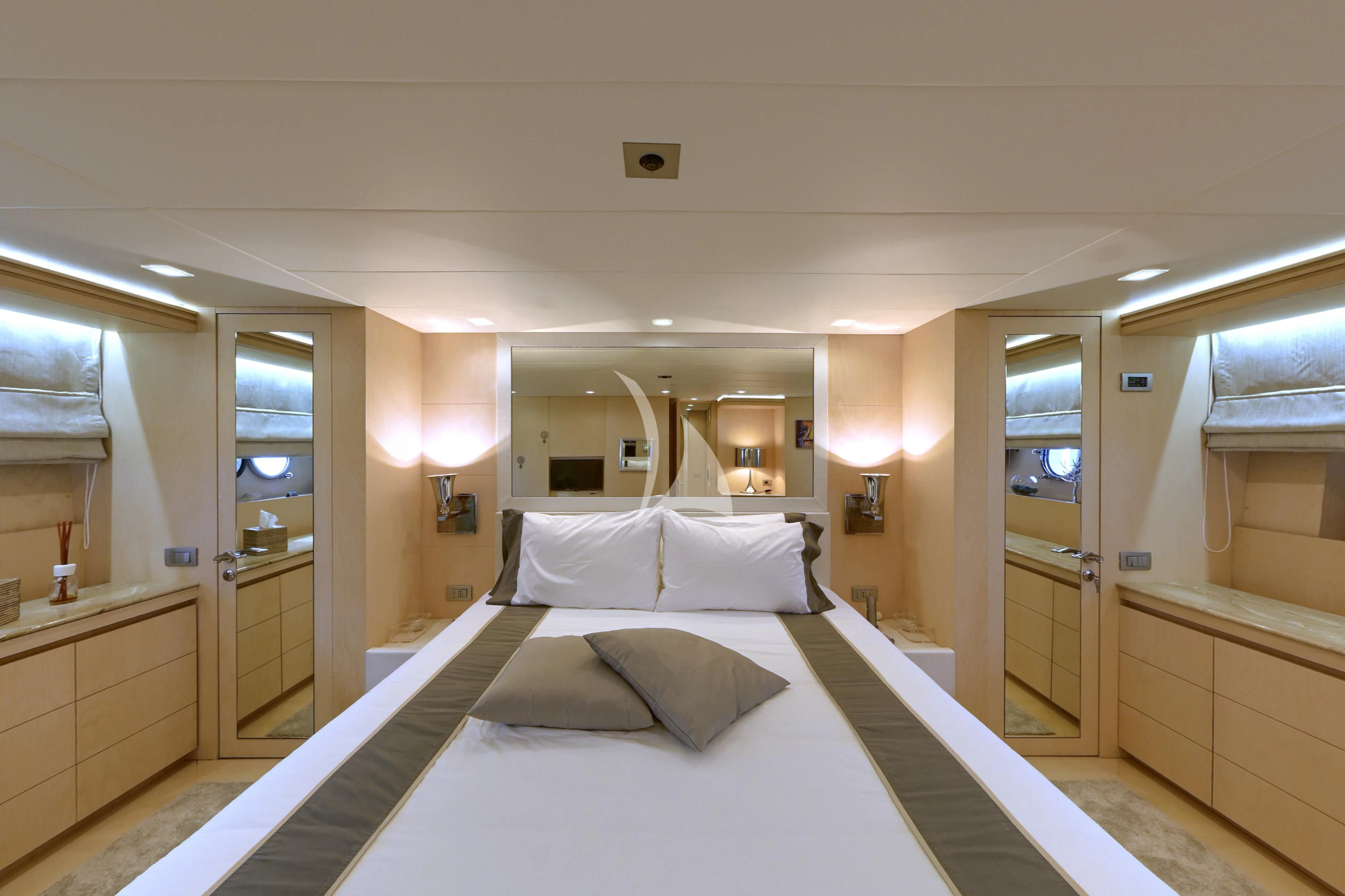 a hotel room with a bed aboard TUSCAN SUN Yacht for Charter