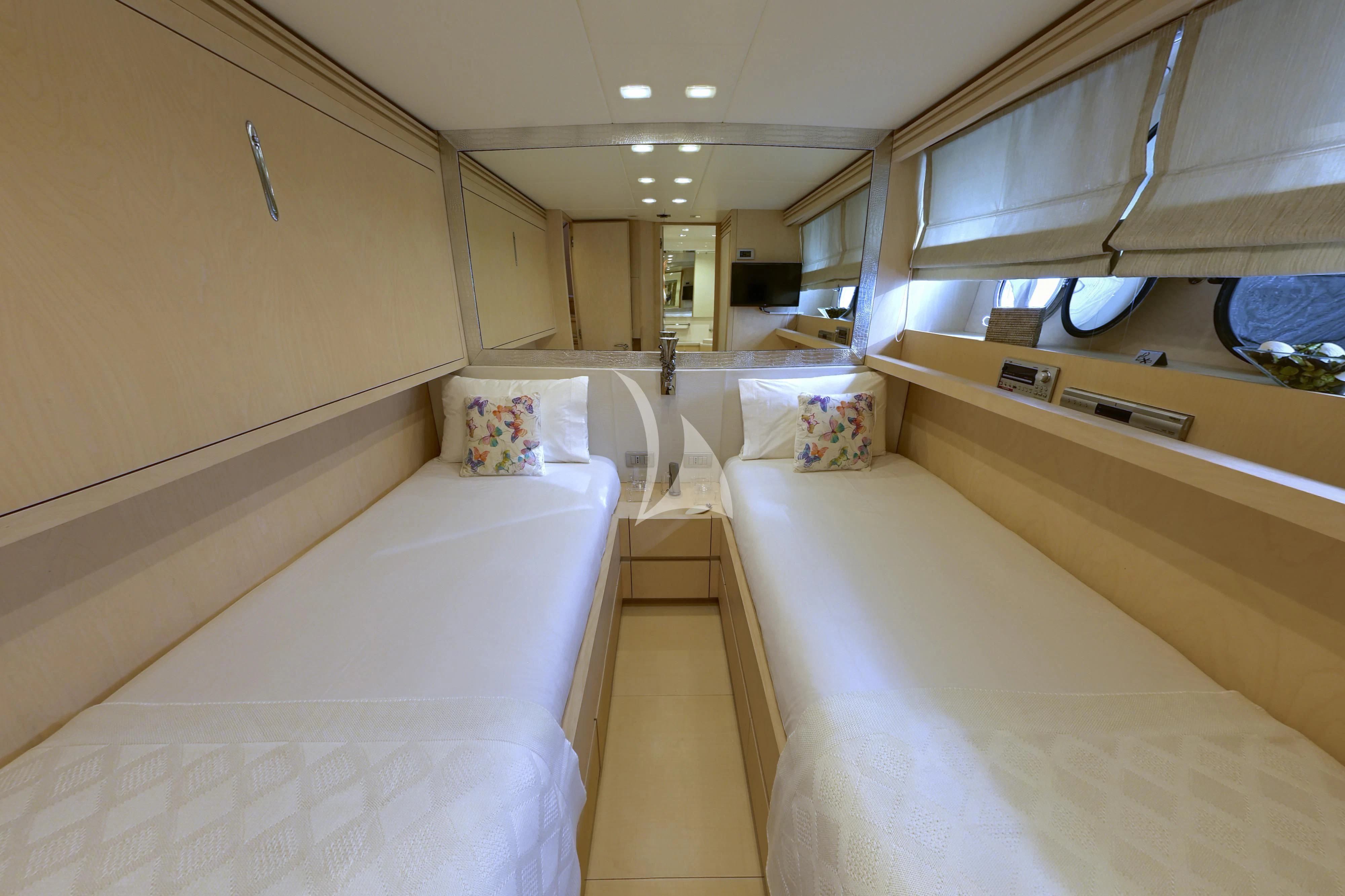 a room with a bed and a sink aboard TUSCAN SUN Yacht for Charter
