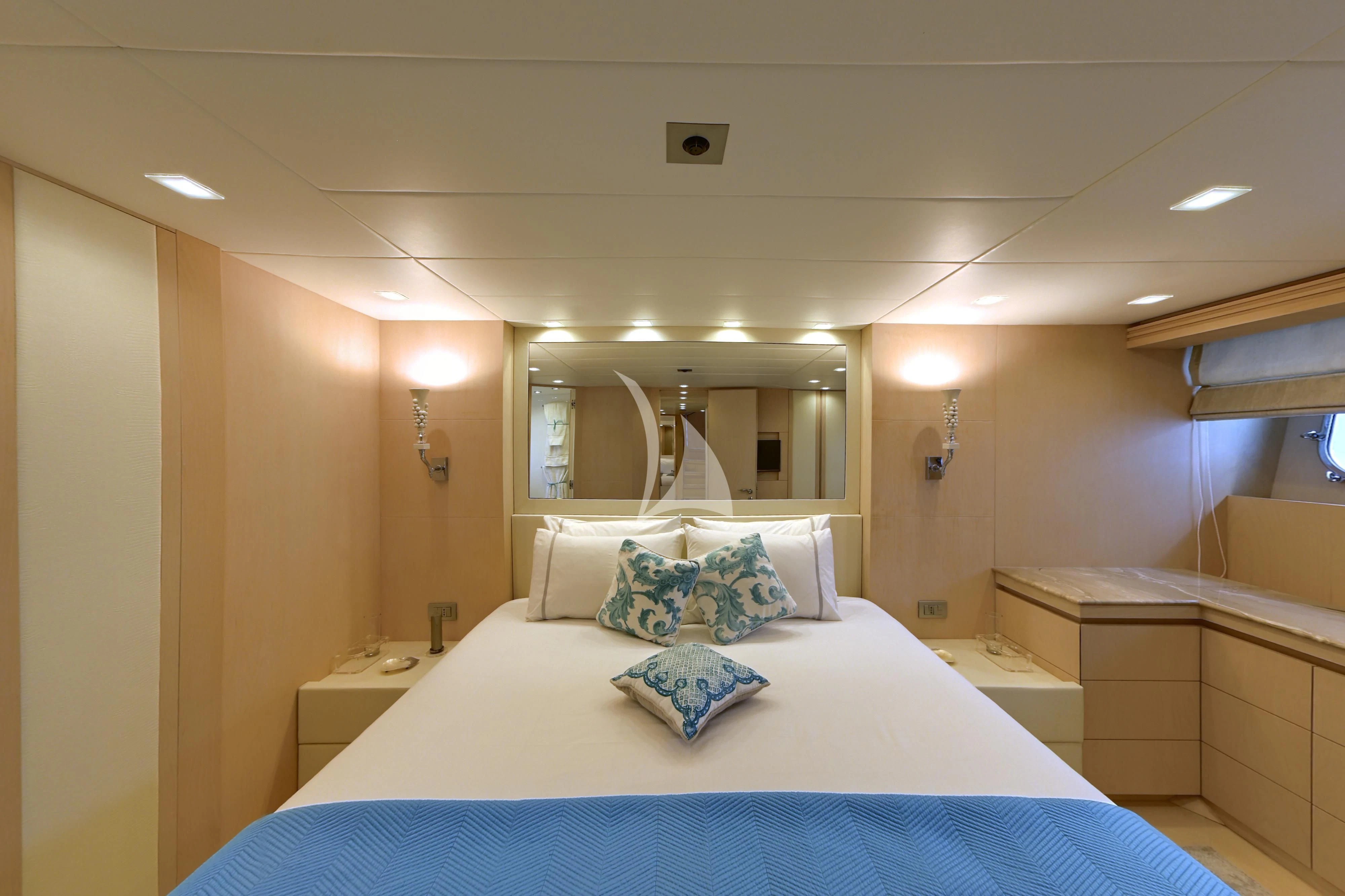 a hotel room with a bed aboard TUSCAN SUN Yacht for Charter