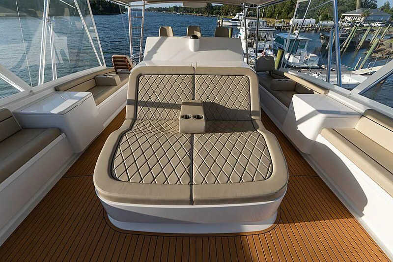 a deck with a chair on it aboard REEL DEVELOPMENT Yacht for Sale