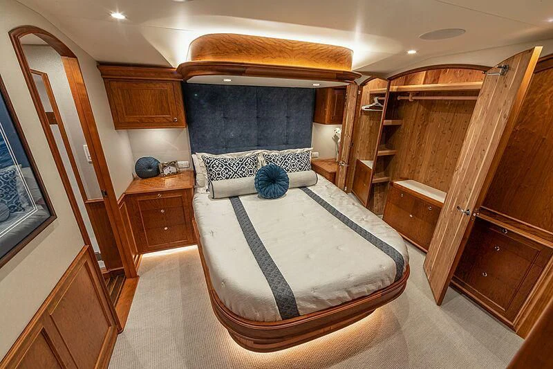a bedroom with a large bed aboard REEL DEVELOPMENT Yacht for Sale