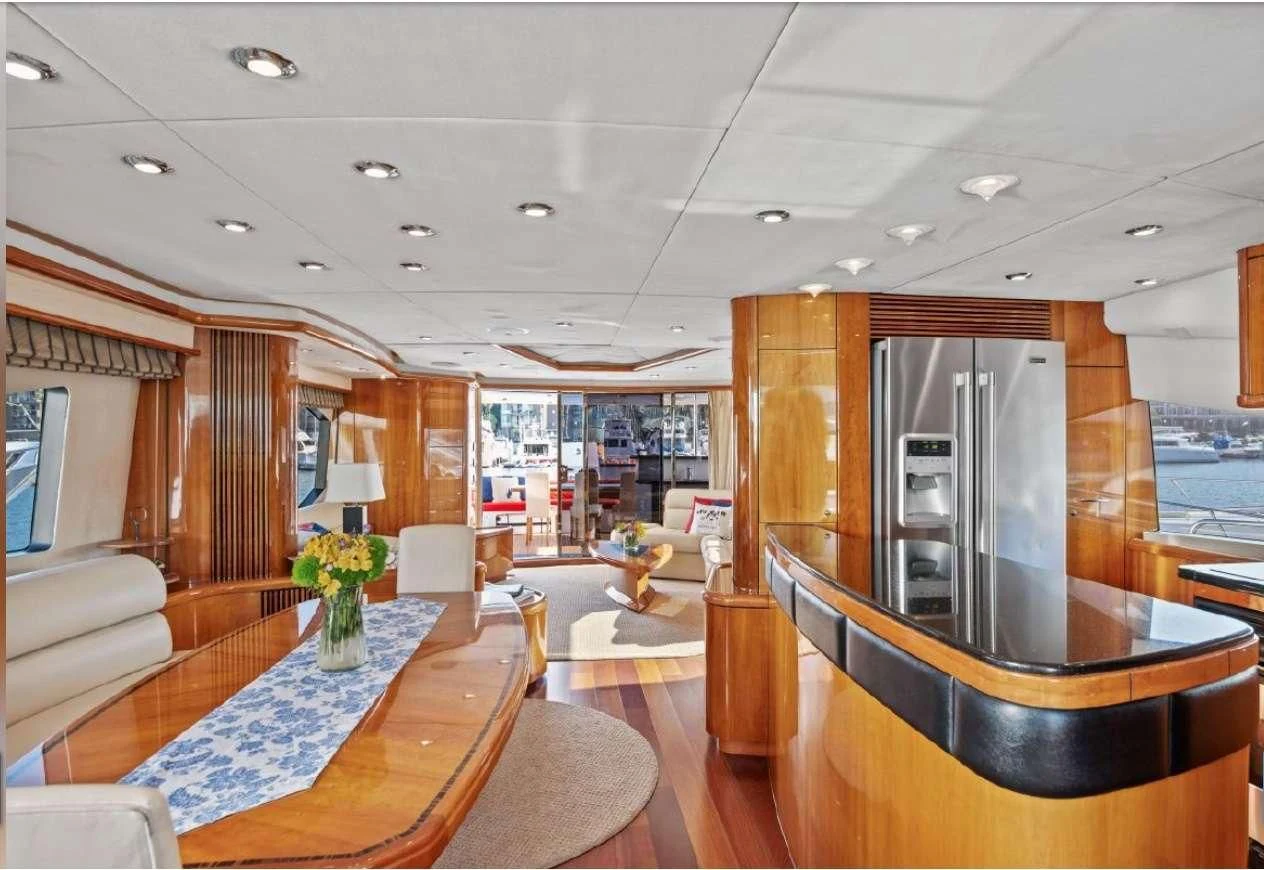 a living room with a large glass door aboard QUANTUM Yacht for Sale