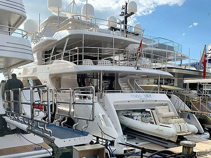 a boat docked at a pier aboard MISS LILY Yacht for Sale