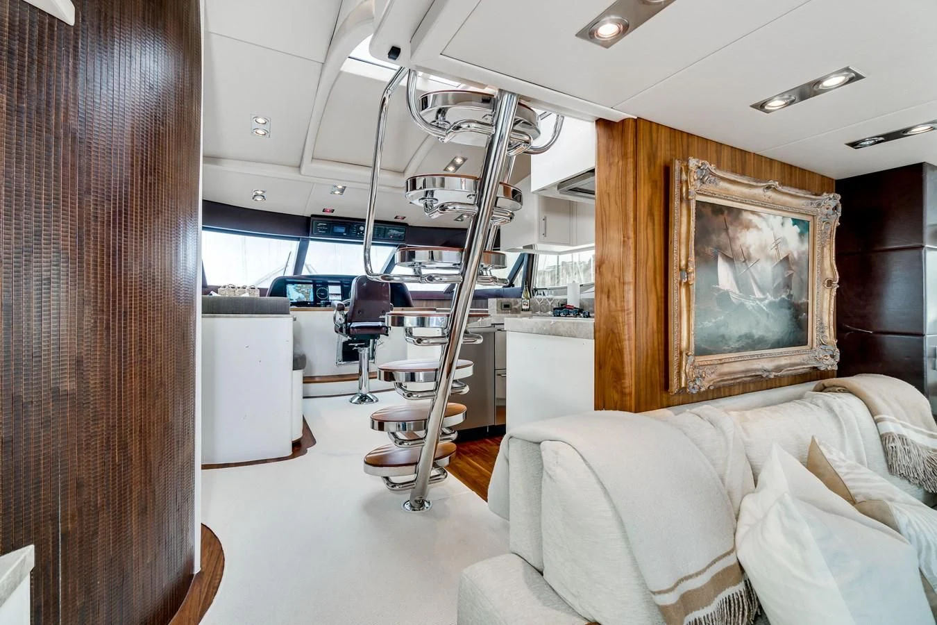a room with a television and a couch aboard UNDAUNTED Yacht for Sale