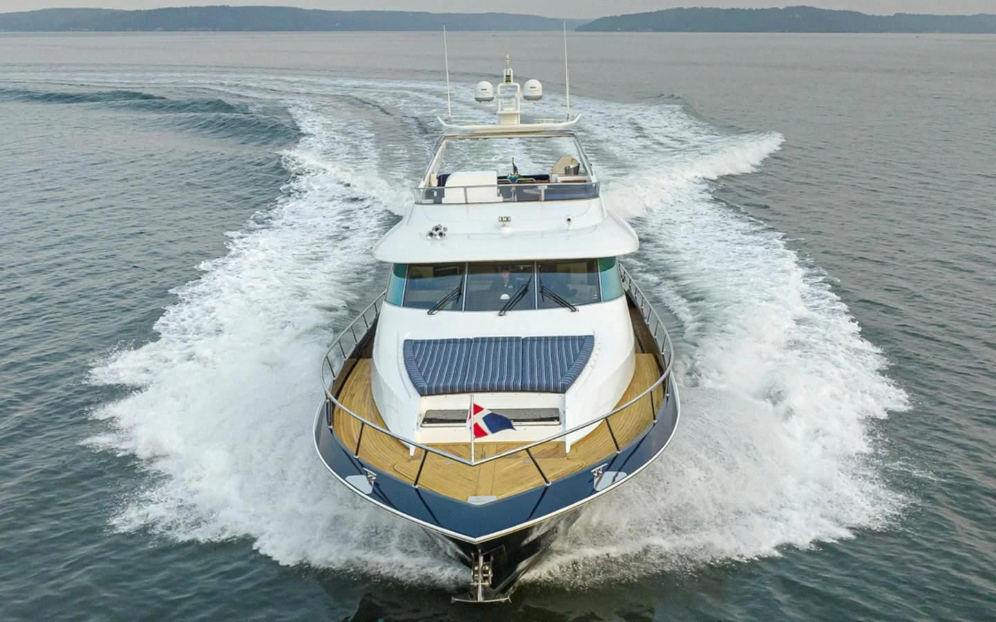 a boat on the water aboard UNDAUNTED Yacht for Sale