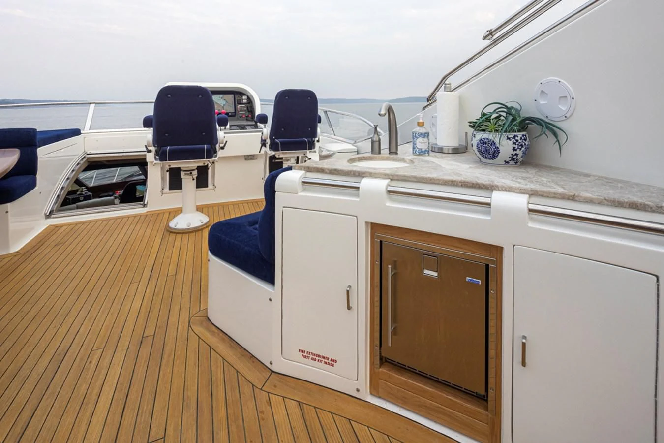 a room with a desk and a chair aboard UNDAUNTED Yacht for Sale