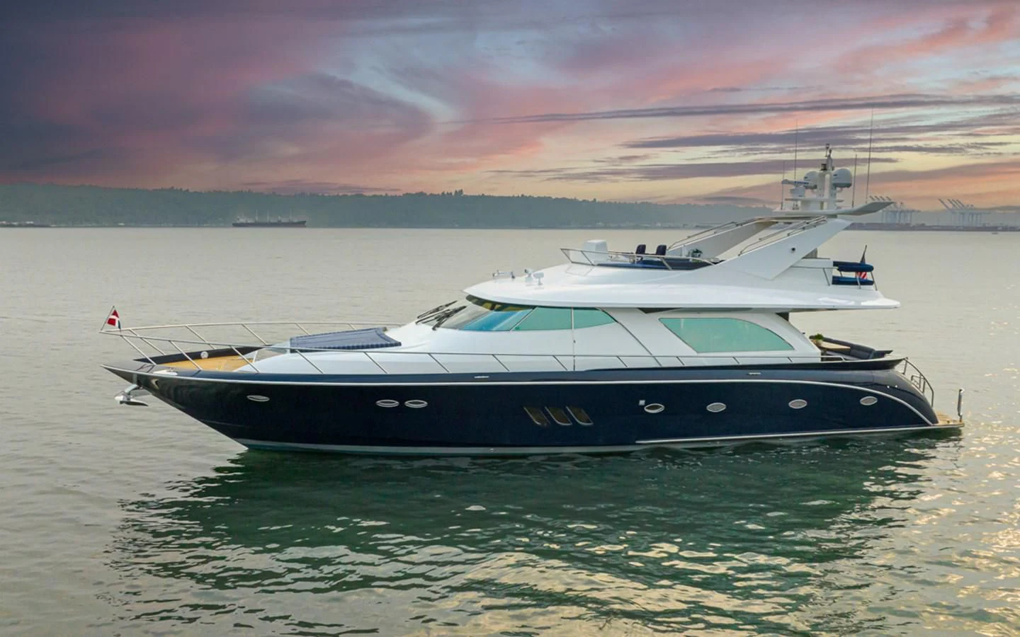 a boat in the water aboard UNDAUNTED Yacht for Sale