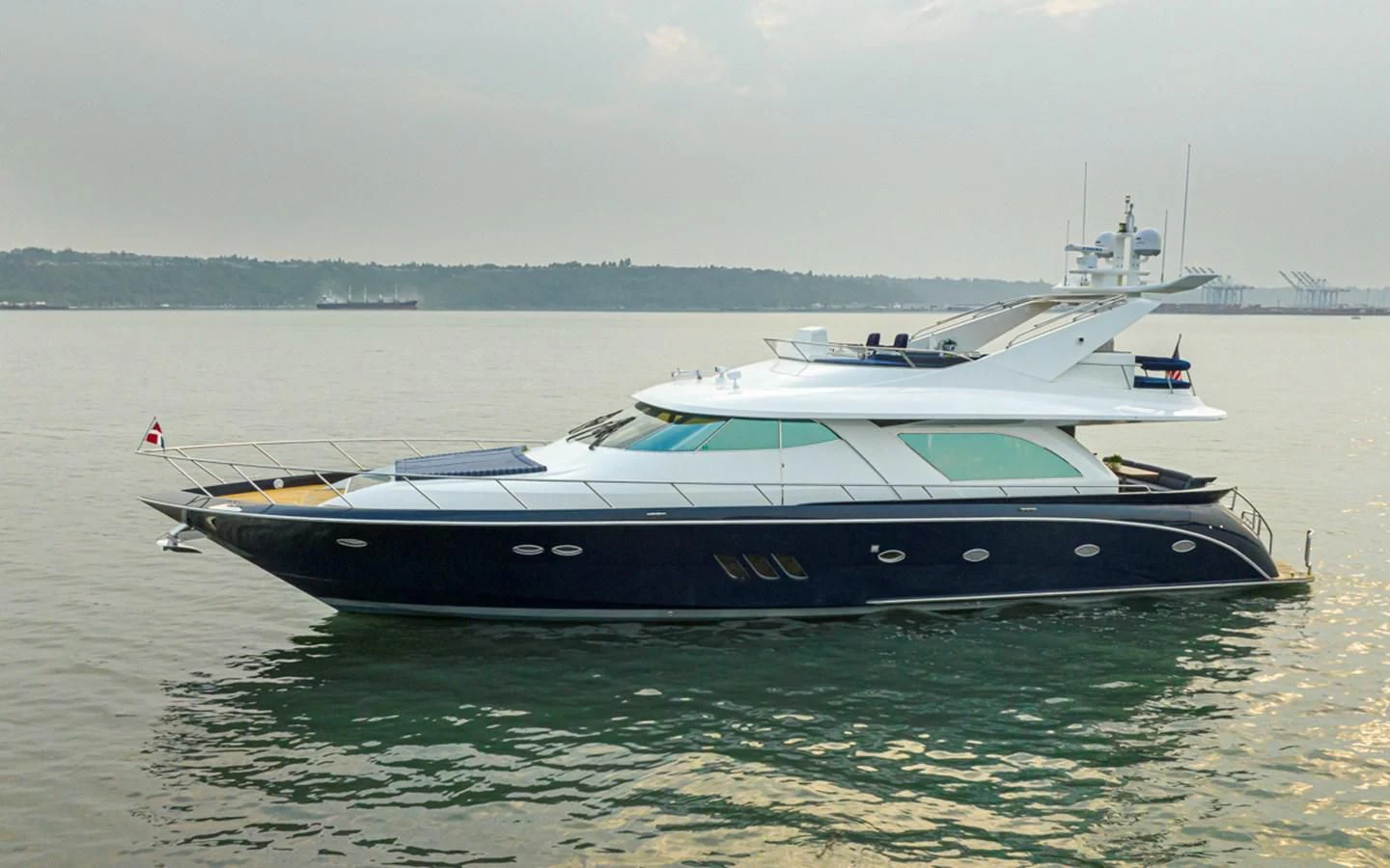 a boat on the water aboard UNDAUNTED Yacht for Sale