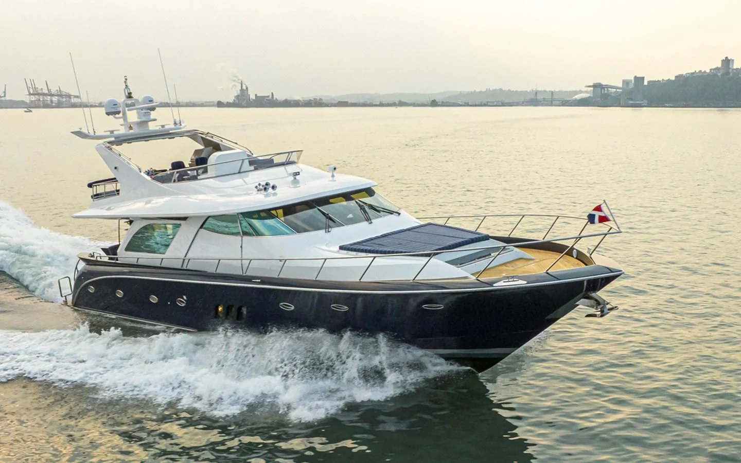 a boat on the water aboard UNDAUNTED Yacht for Sale