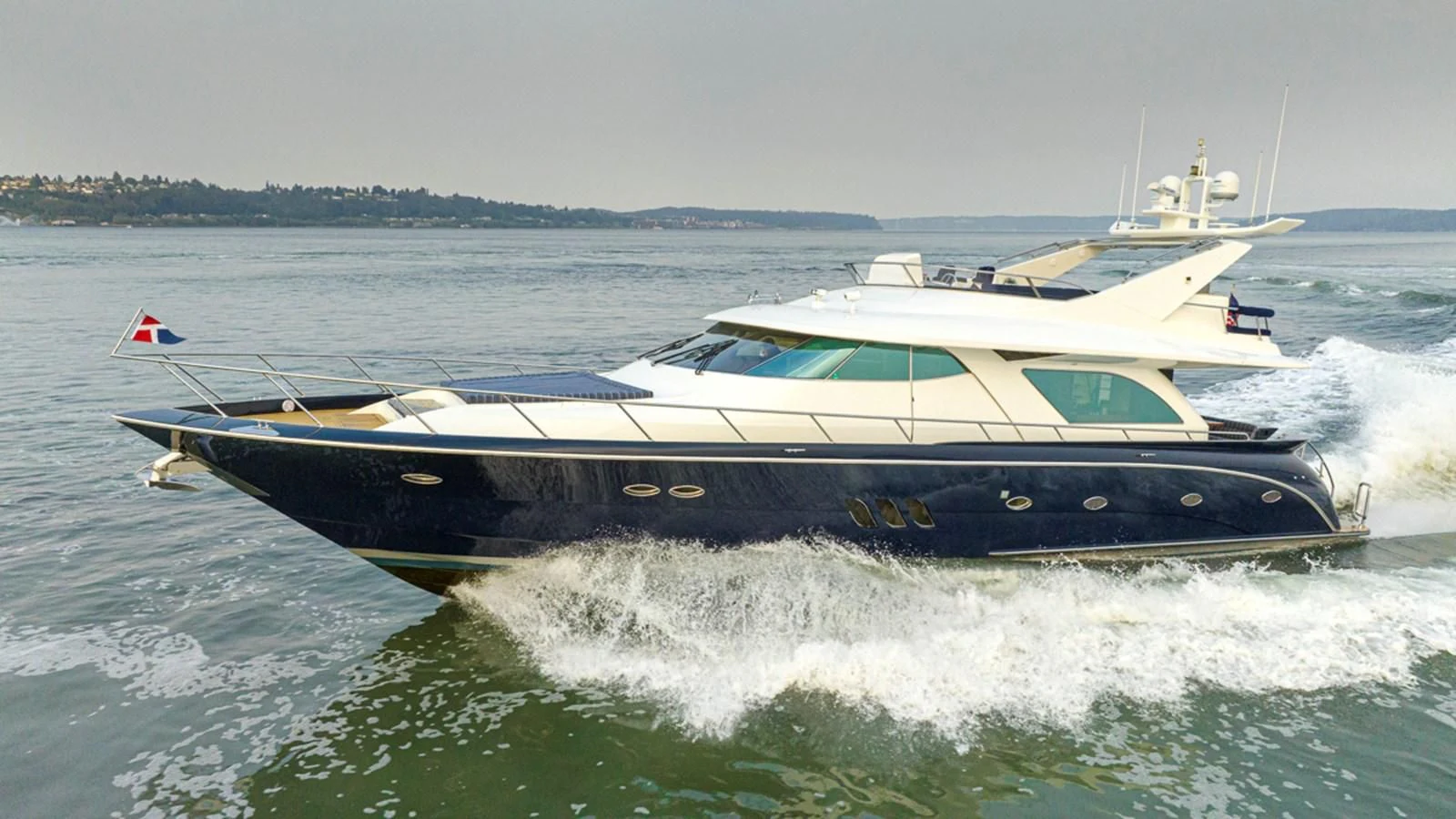 a boat on the water aboard UNDAUNTED Yacht for Sale