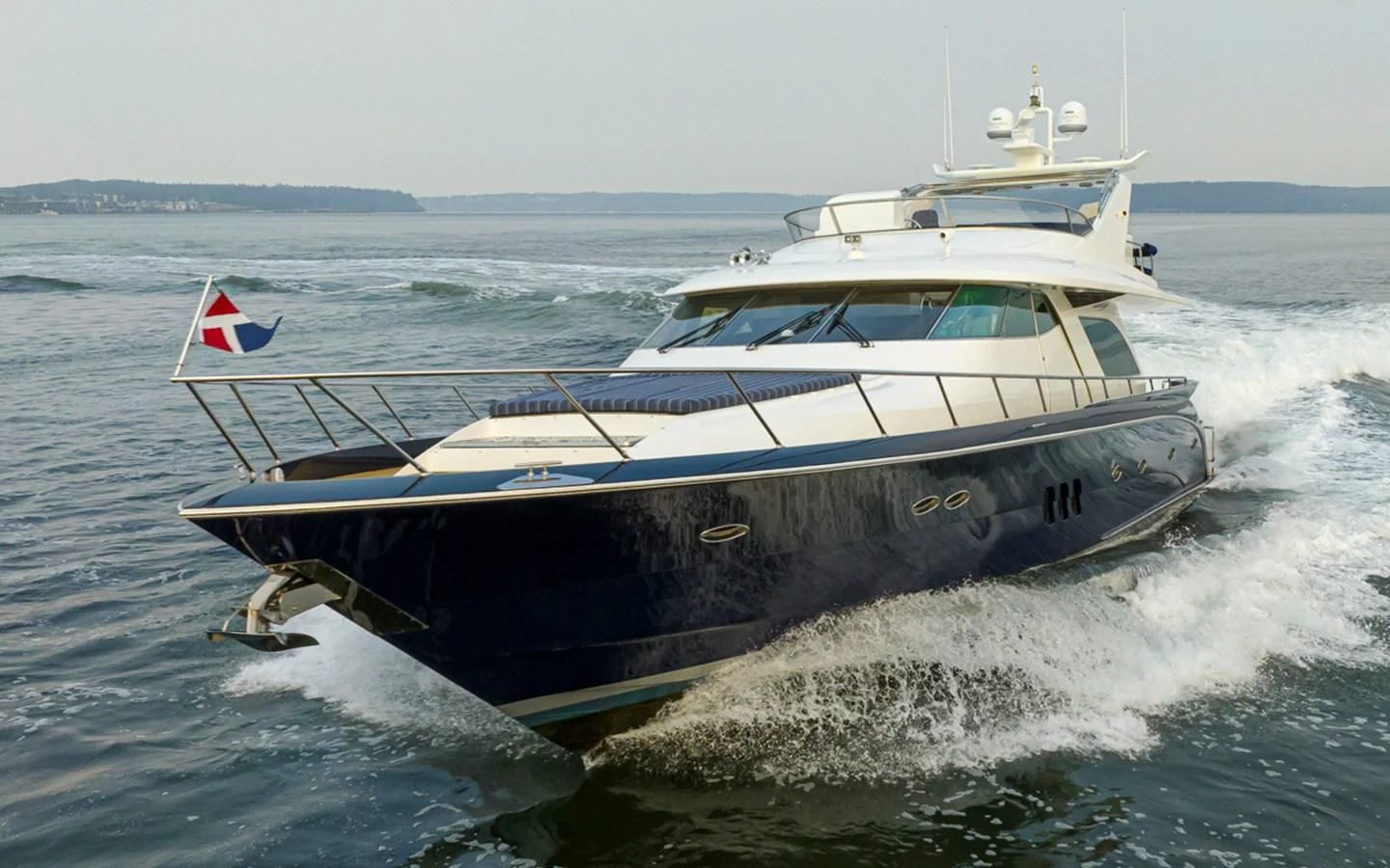 a boat on the water aboard UNDAUNTED Yacht for Sale