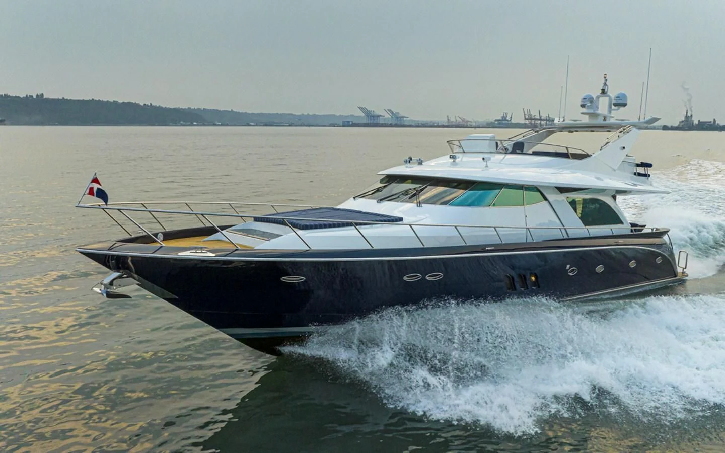 a boat on the water aboard UNDAUNTED Yacht for Sale
