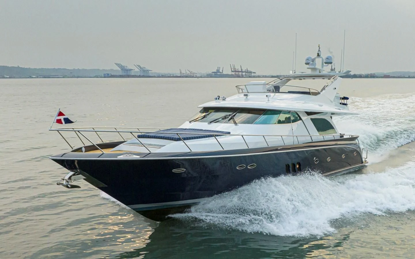 a boat on the water aboard UNDAUNTED Yacht for Sale