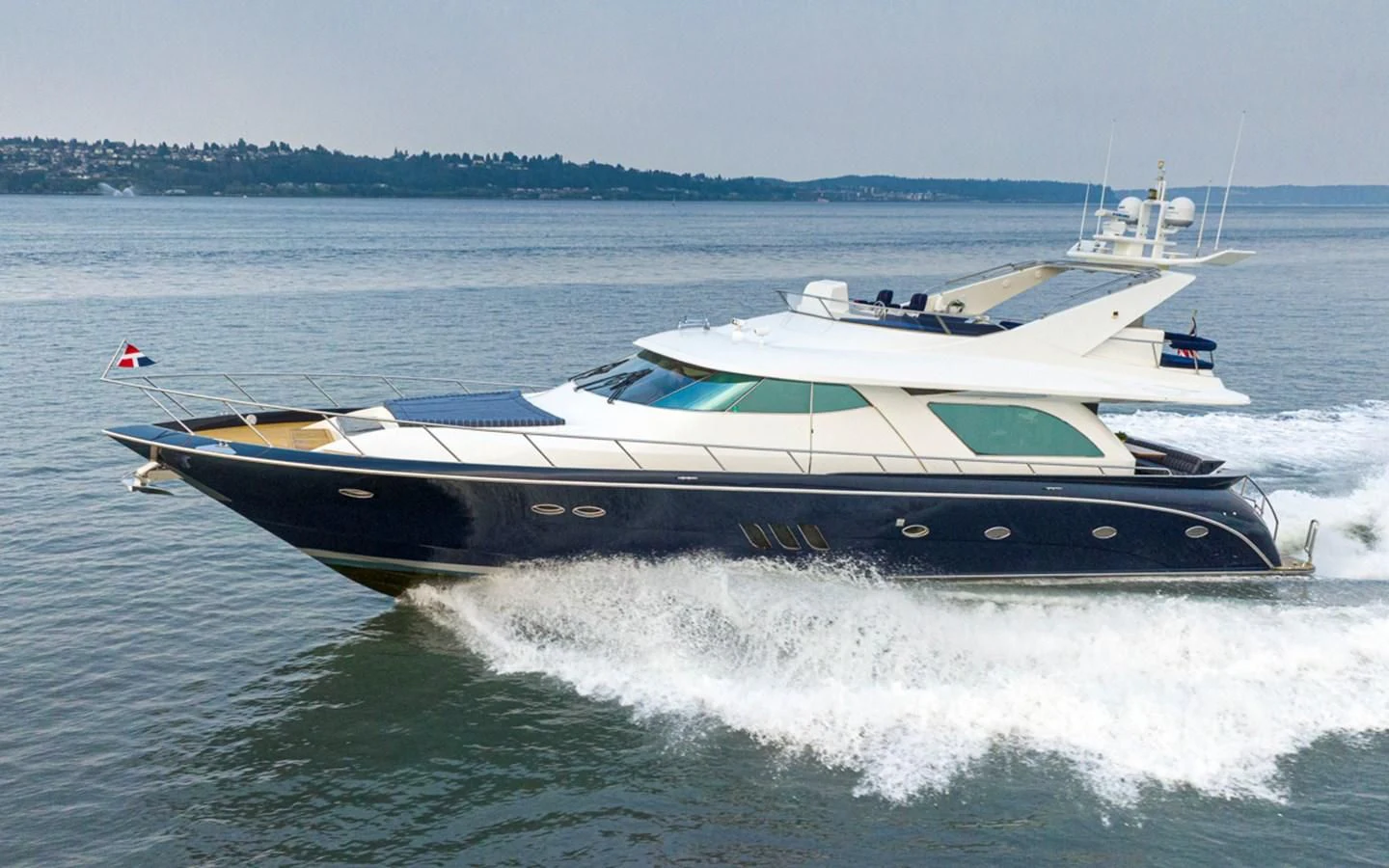 a boat on the water aboard UNDAUNTED Yacht for Sale