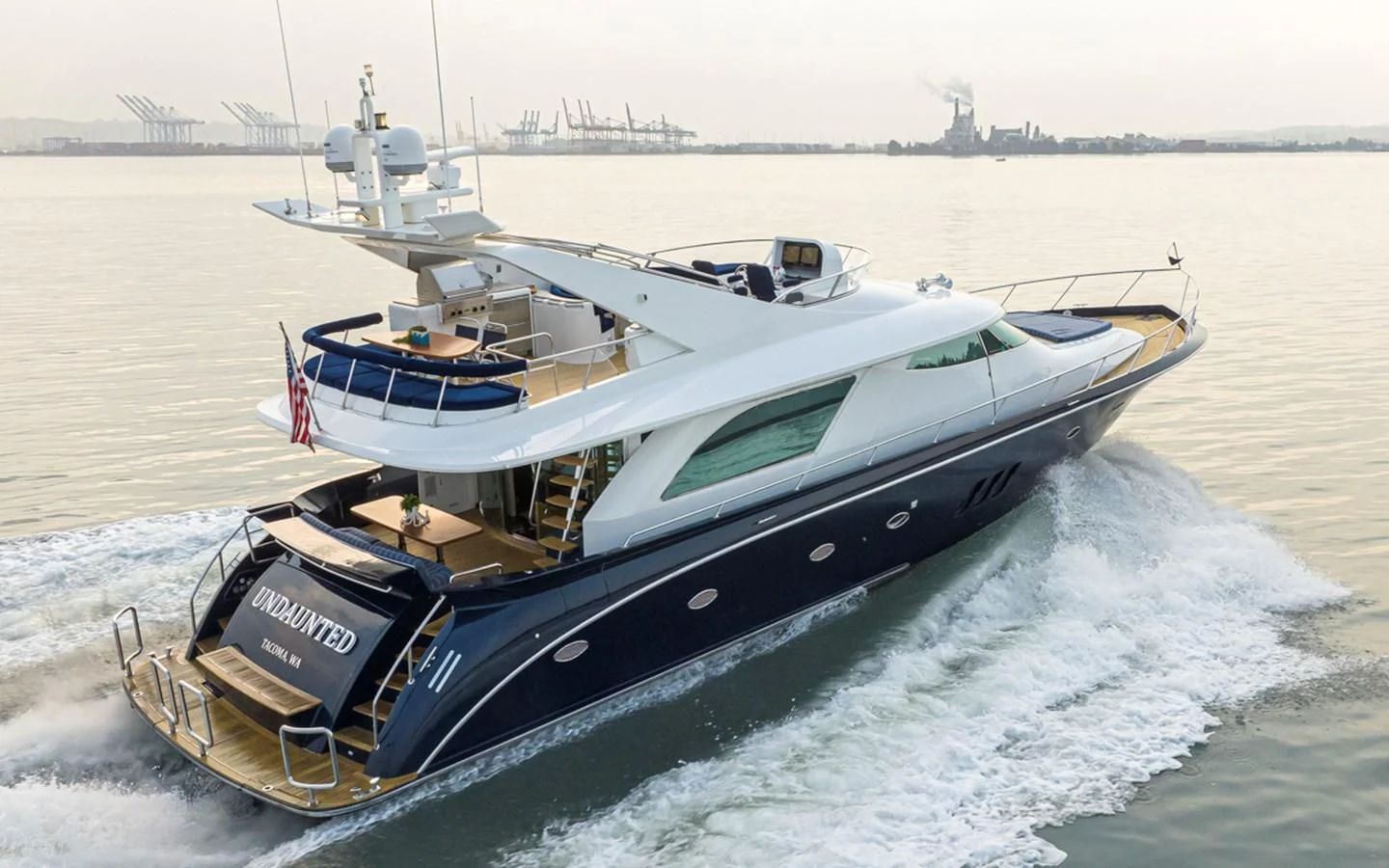 a boat on the water aboard UNDAUNTED Yacht for Sale