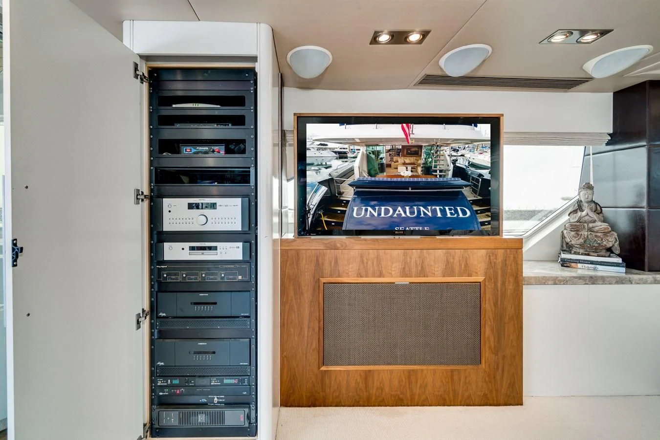a computer on a desk aboard UNDAUNTED Yacht for Sale
