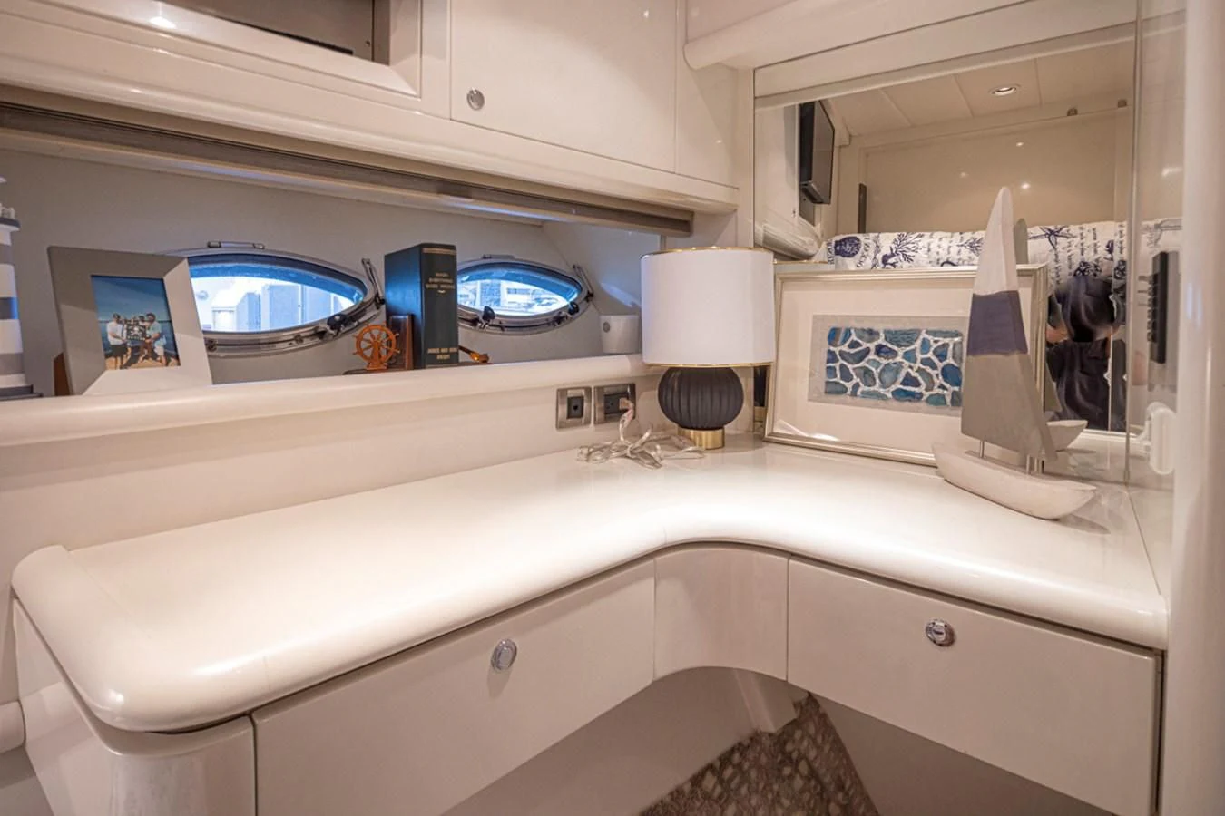 a bathroom with a large mirror aboard UNDAUNTED Yacht for Sale