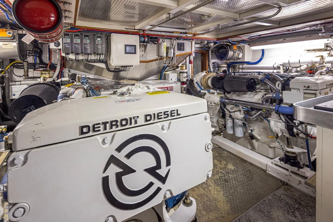 a large white machine in a factory aboard UNDAUNTED Yacht for Sale