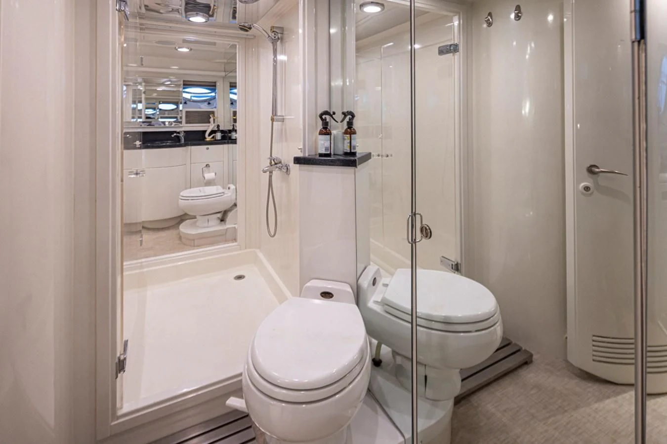 a bathroom with a stand up shower aboard UNDAUNTED Yacht for Sale