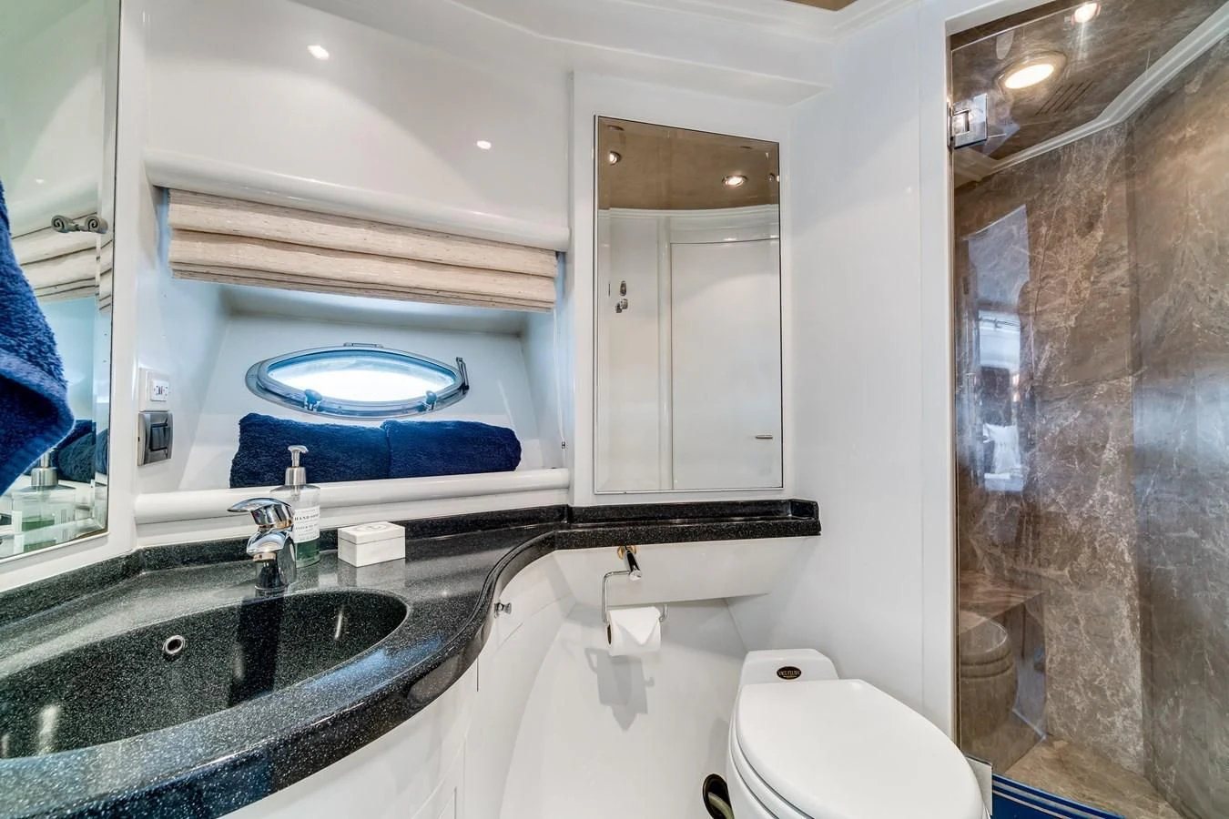 a bathroom with a large jacuzzi tub aboard UNDAUNTED Yacht for Sale